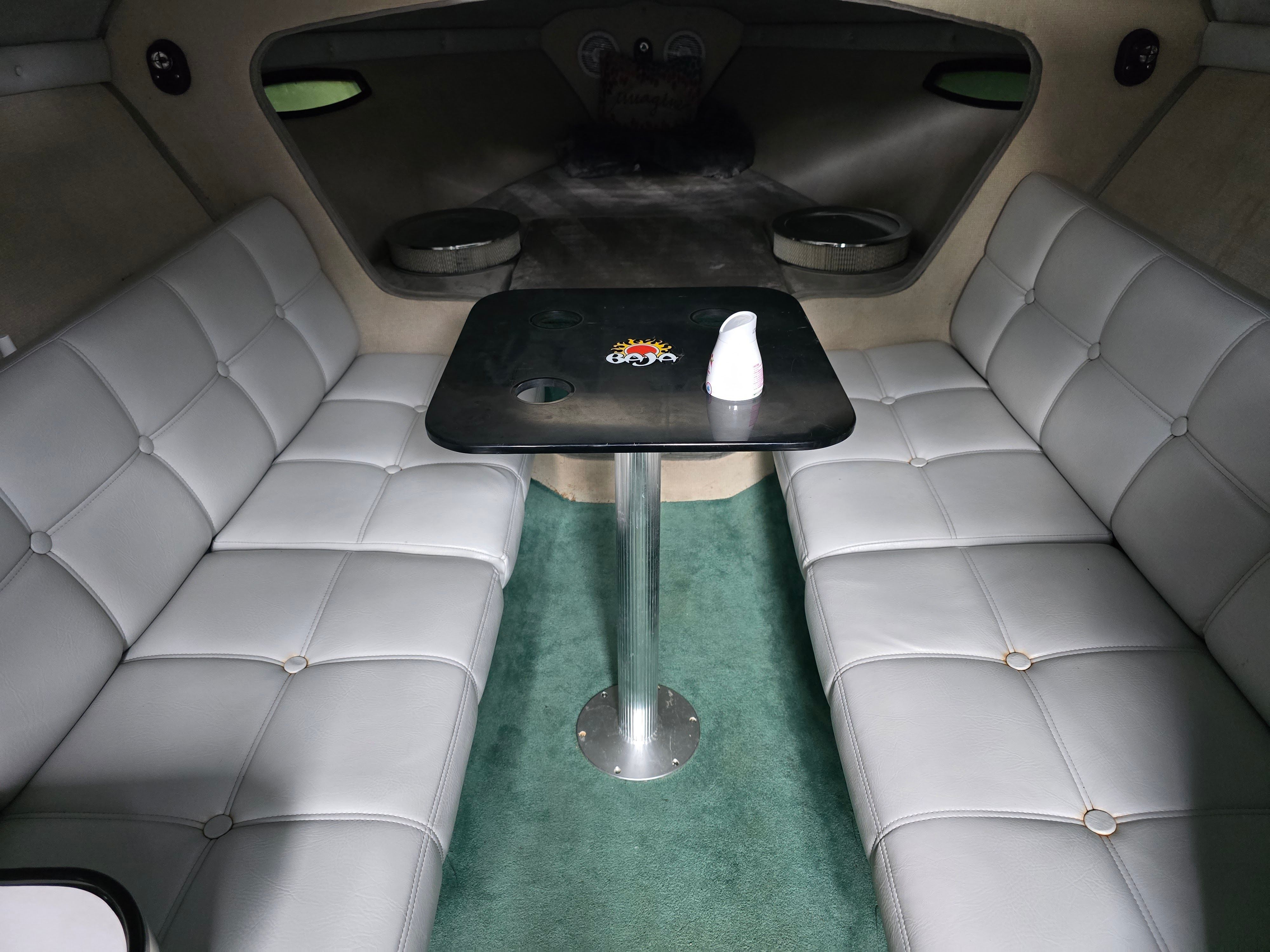 Interior of a 1989 Baja 280 Sport with gray leather seating.