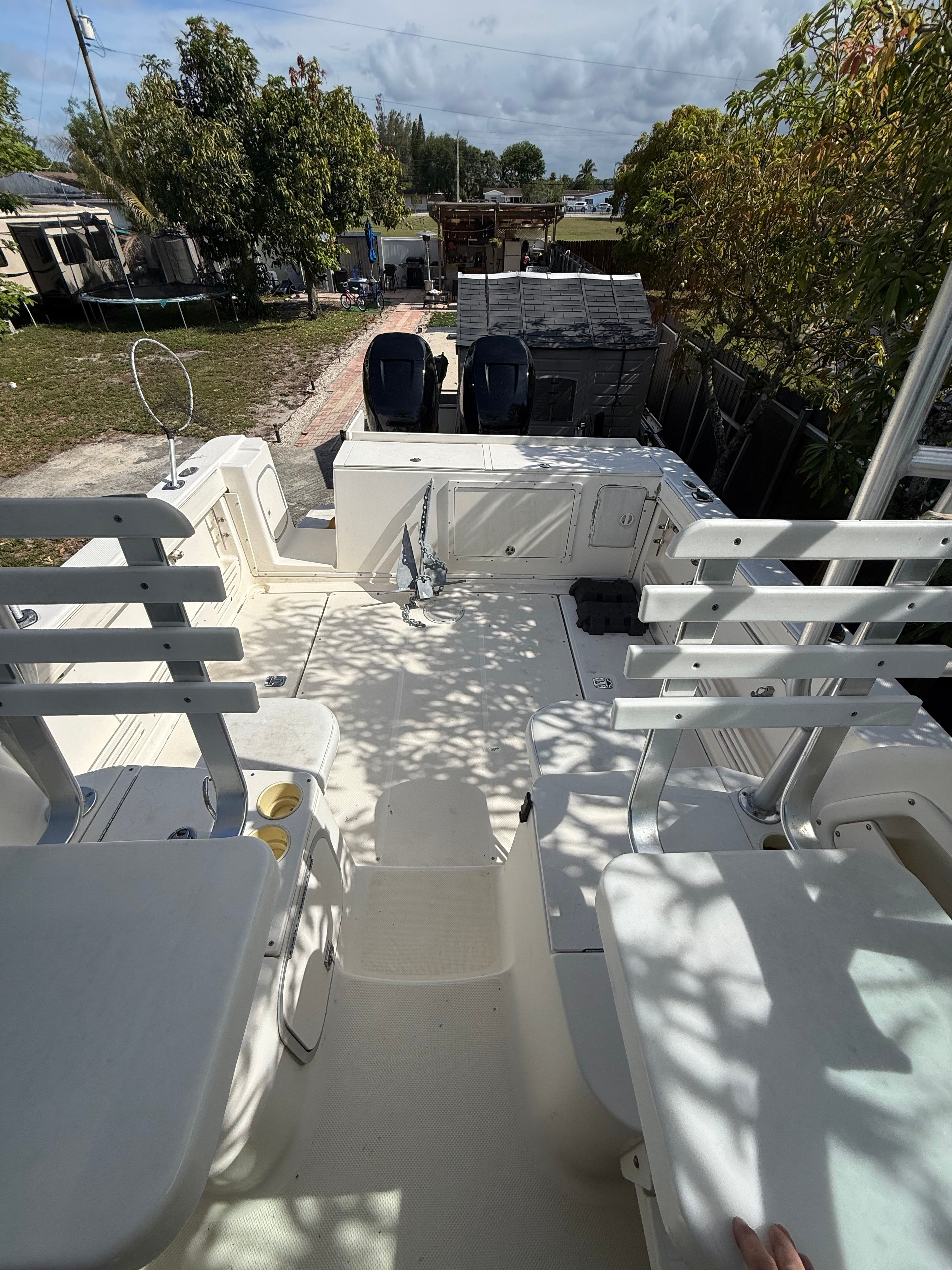 2005 Trophy 2902 Walkaround boat with spacious deck and seating area.