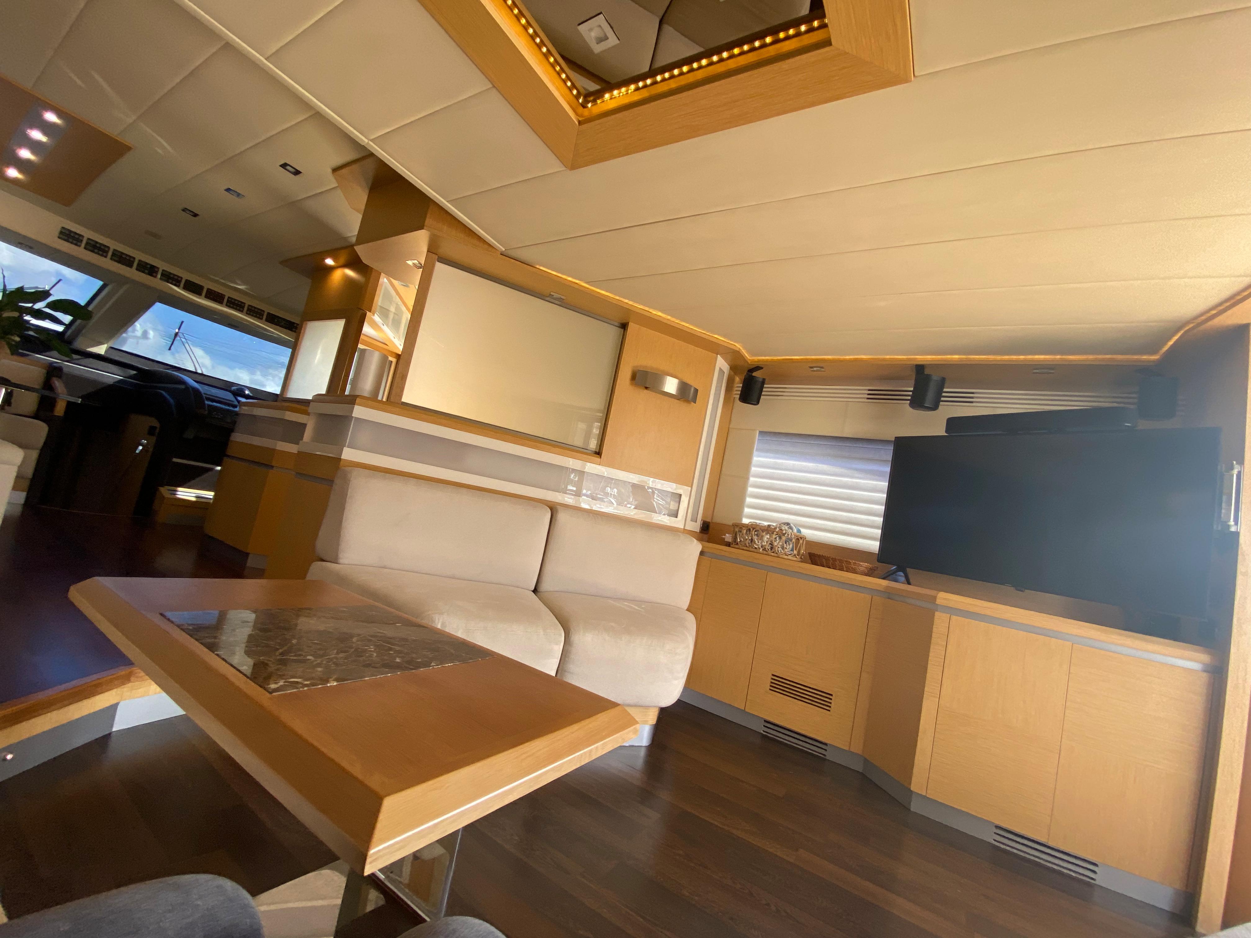 Luxurious interior of 2008 Dominator 680 yacht with modern furnishings and elegant design.