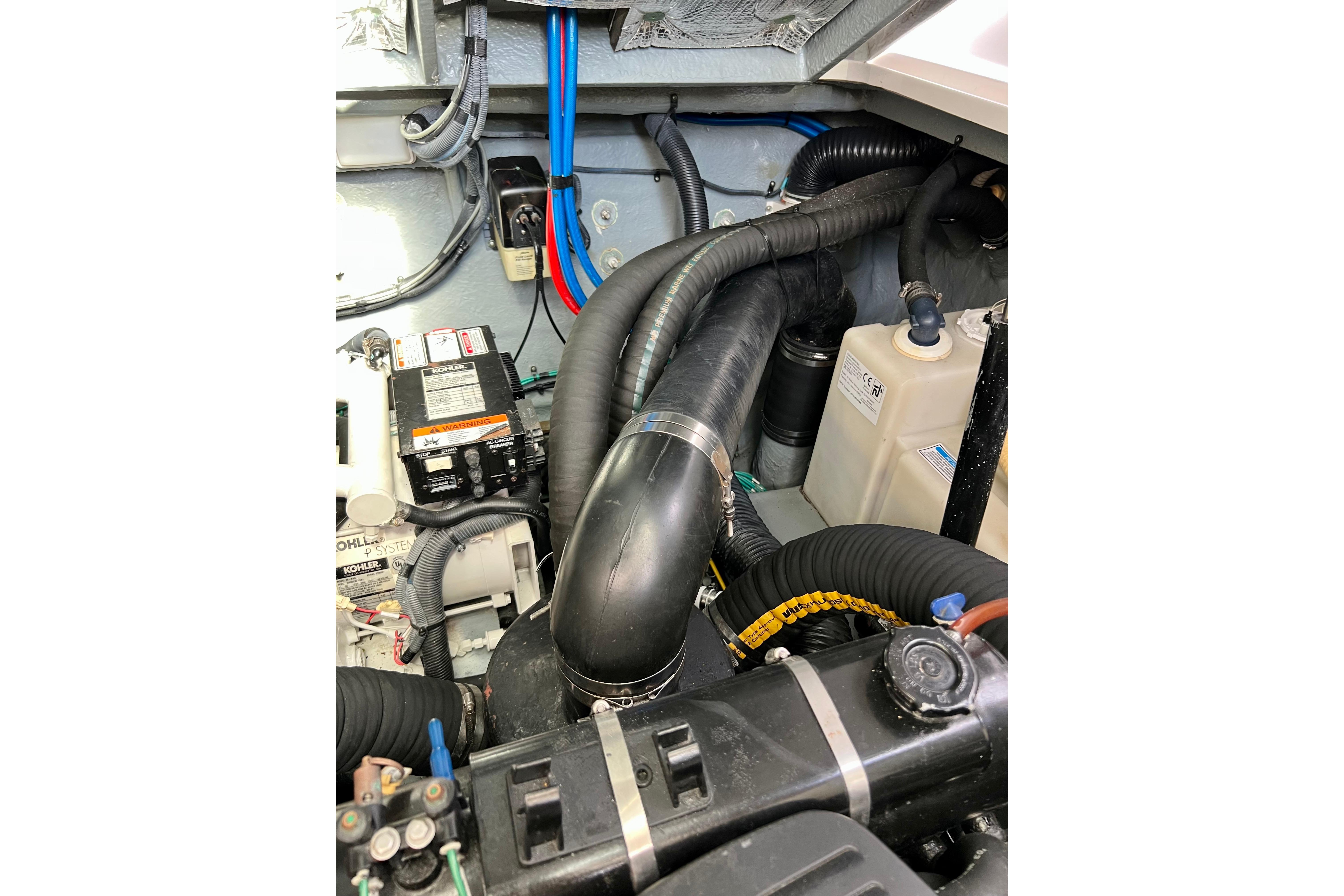 Engine compartment of a 2004 Sea Ray 320 Sundancer boat.