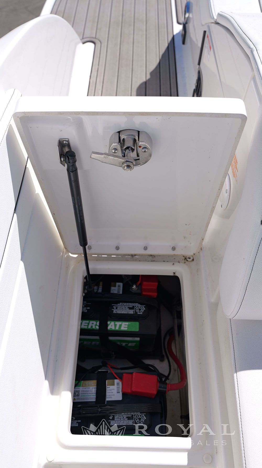 Battery compartment on a 2014 Sea Ray SLX 230 boat.