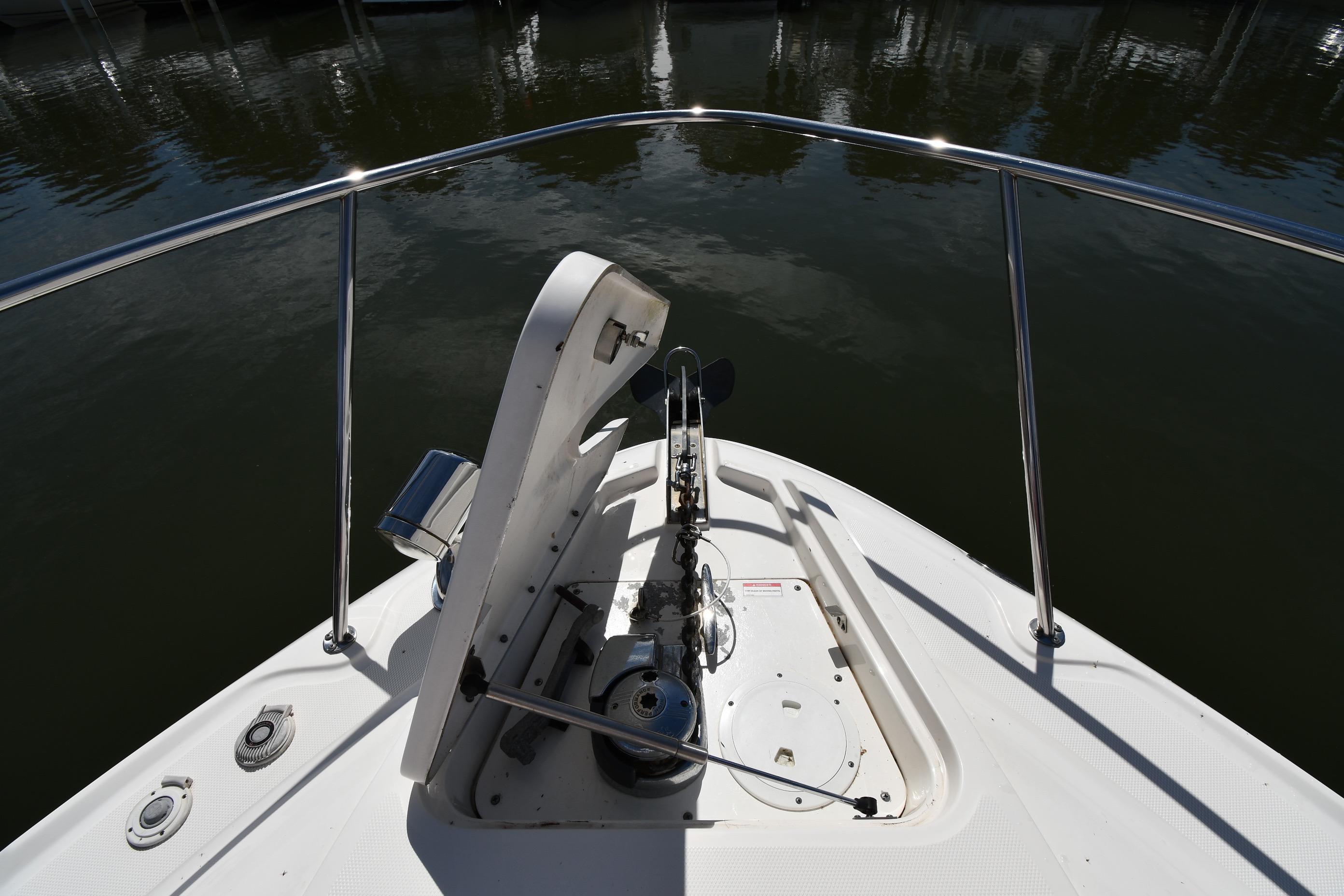 Bow view of 2008 Sea Ray Sundancer 350 yacht, featuring anchor and railing.