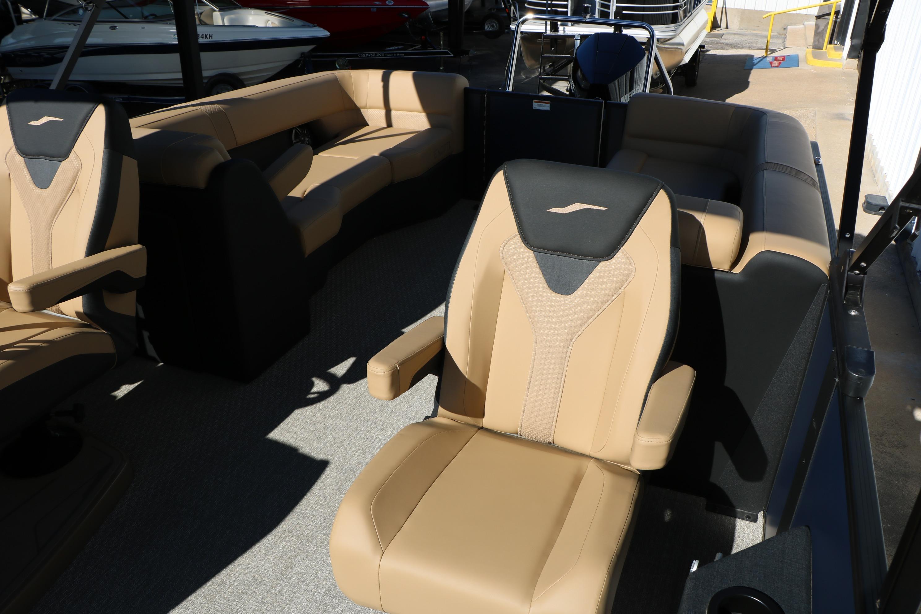2026 Evotti 525 QL Tri-Toon interior with luxurious tan seating and modern design.