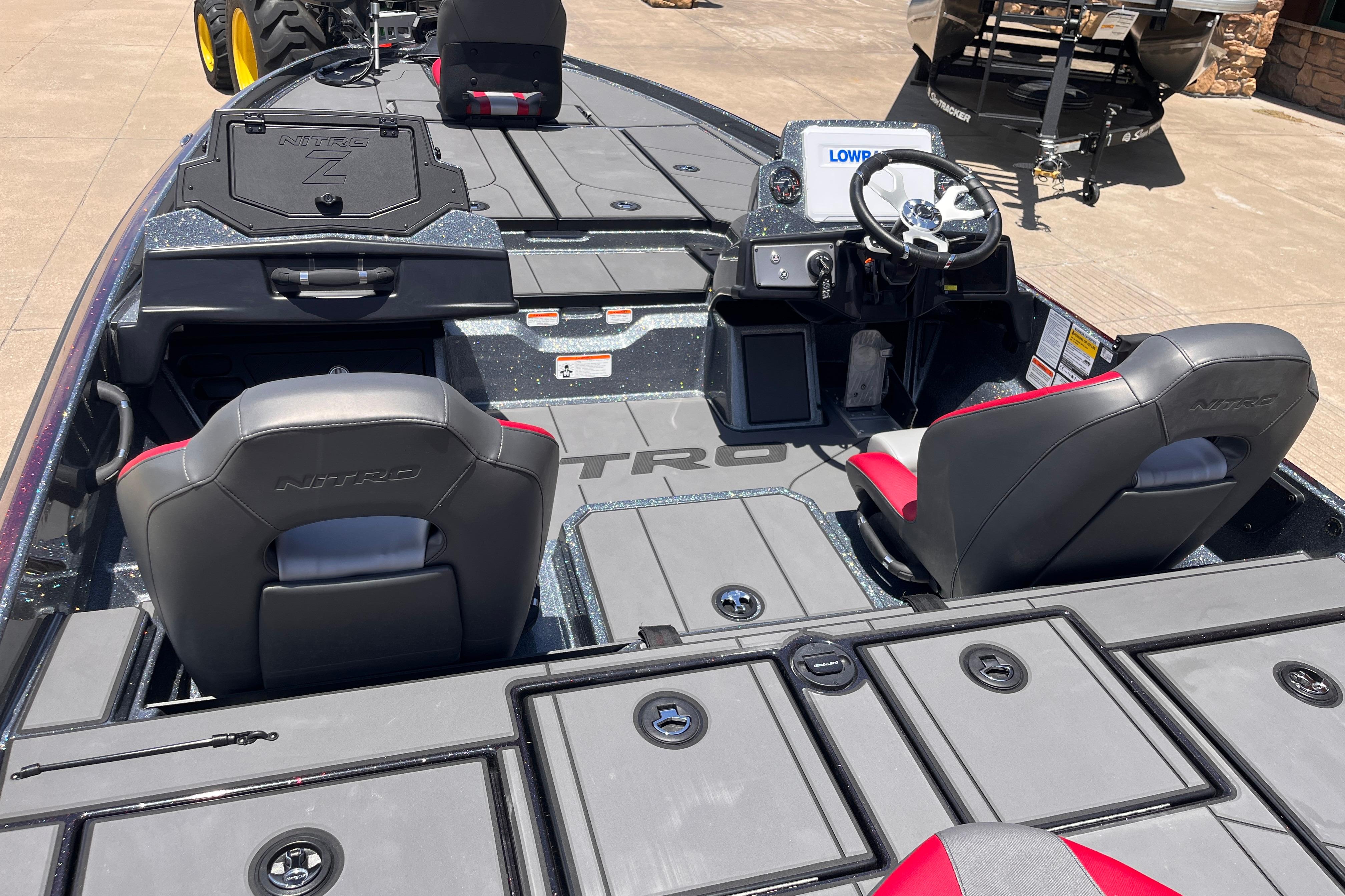 2026 Nitro Z21 XL boat interior with dual seats and steering console.