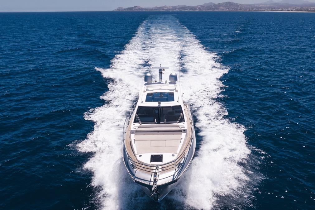 Luxurious 2020 Azimut 60 yacht cruising on open blue sea.