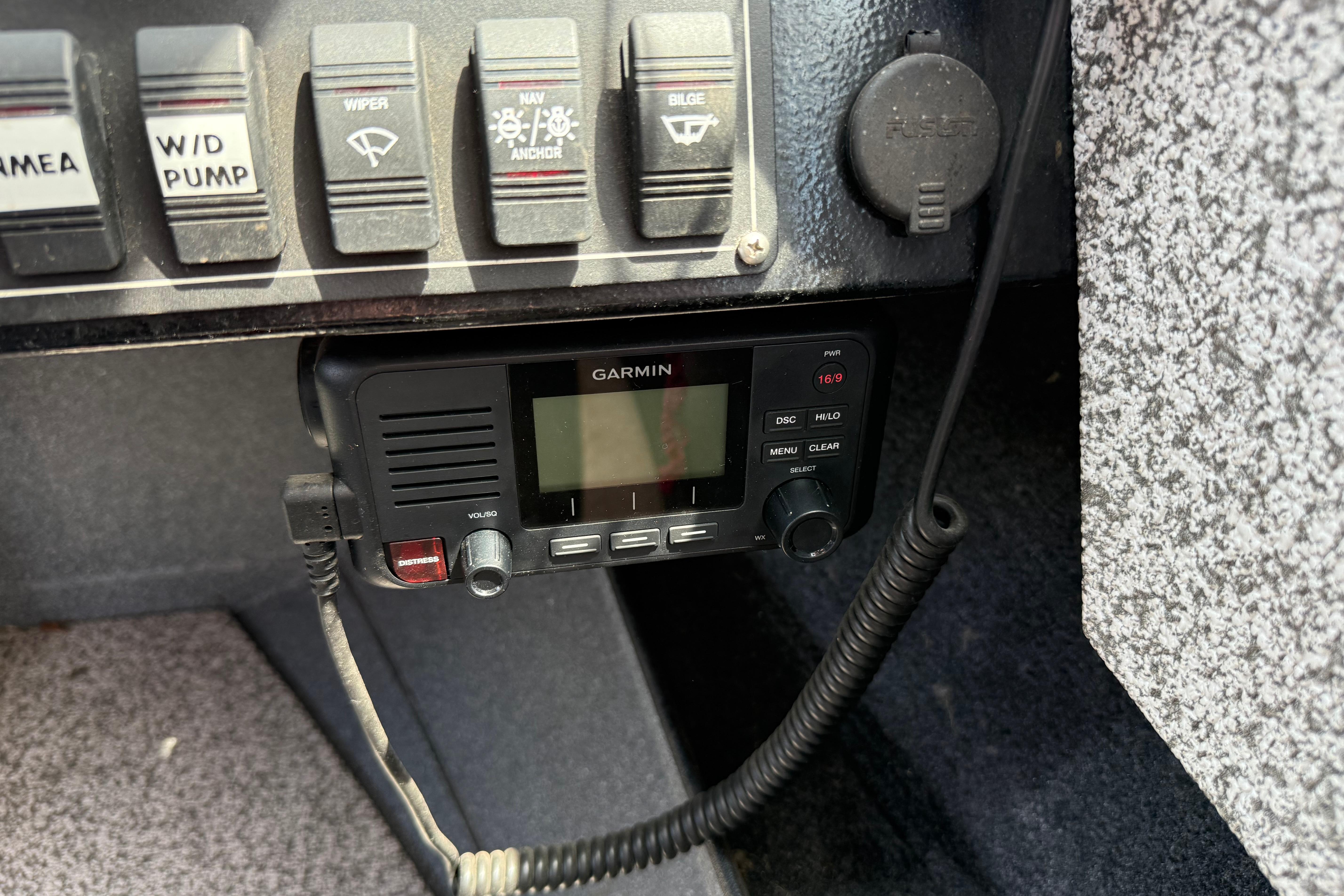 Control panel and Garmin radio in 2019 Alumaweld Intruder Hard Top 22' boat.
