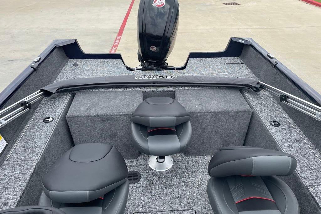 2026 Tracker Pro Guide V-175 Combo boat interior with seating and motor.