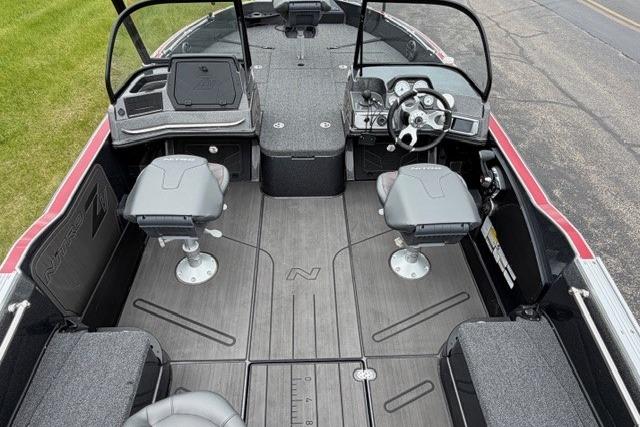 2024 Nitro ZV21 boat interior with dual seats, steering console, and spacious deck.