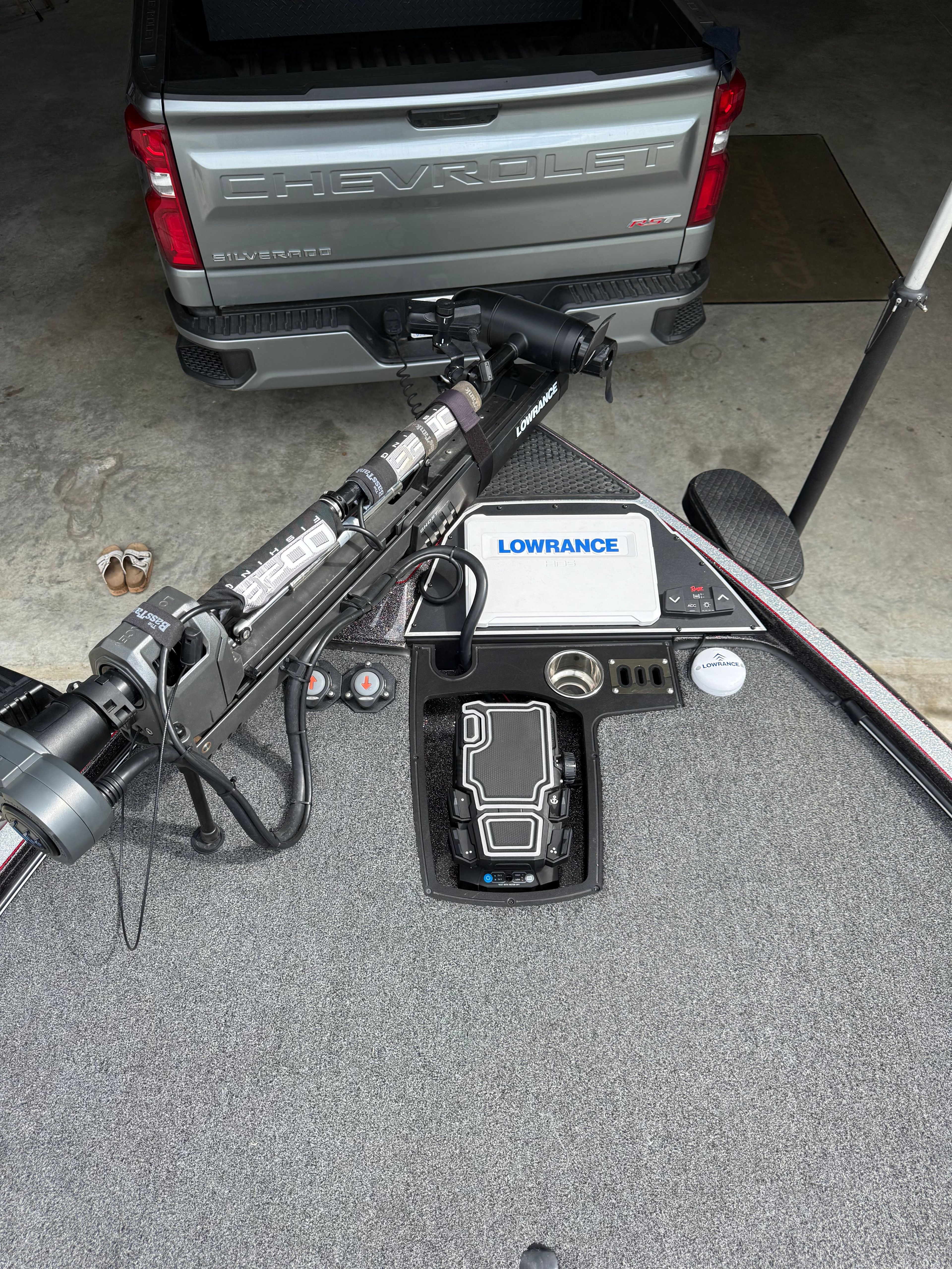 Ranger Z520R 2024 with Lowrance equipment next to Chevrolet Silverado.
