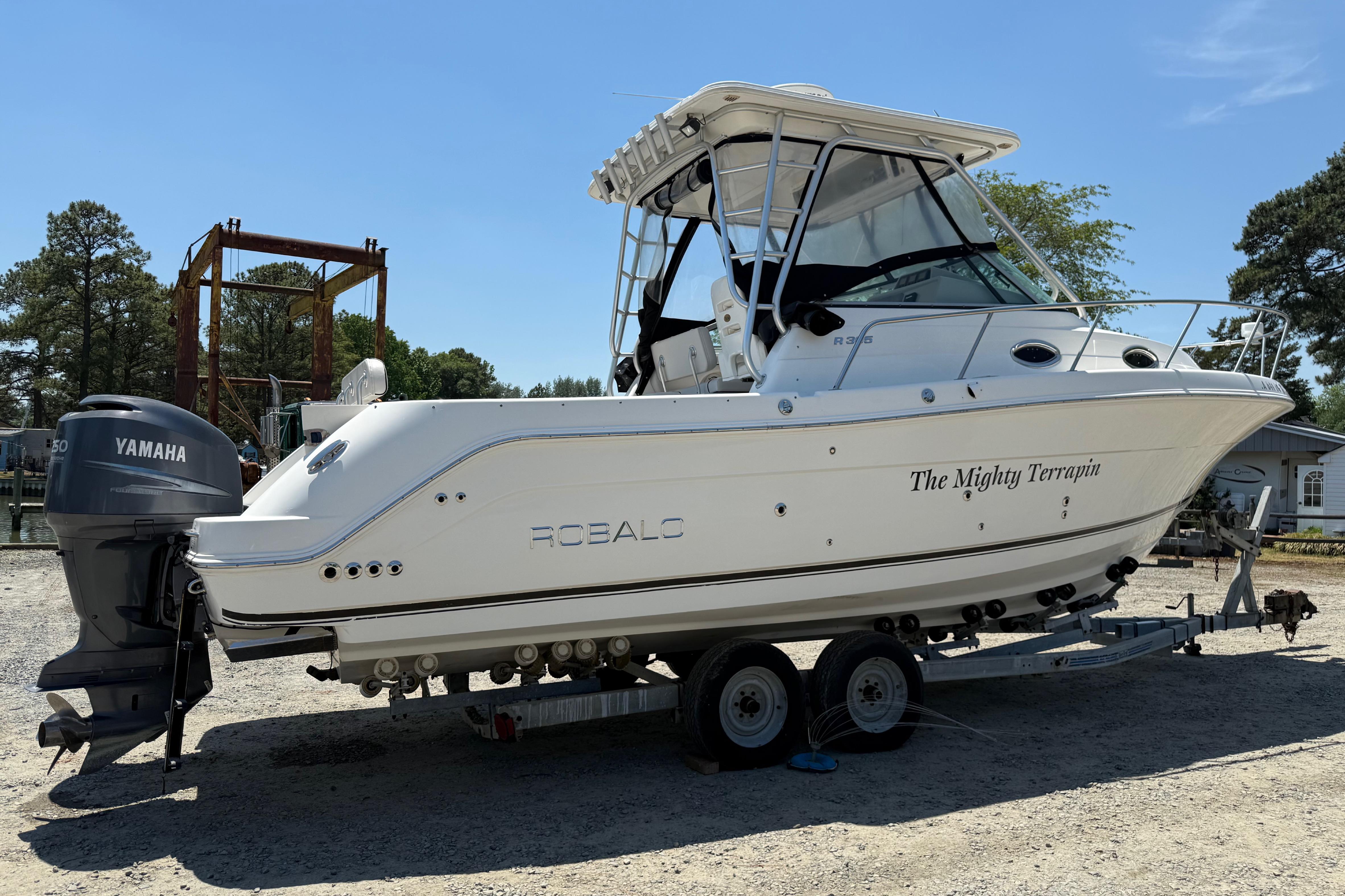 2007 Robalo R305 Walkaround boat on trailer with Yamaha engine, named "The Mighty Terrapin."