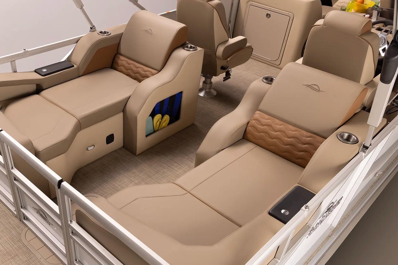 Luxurious interior of 2026 SunCatcher Select 322SL pontoon boat with plush seating.
