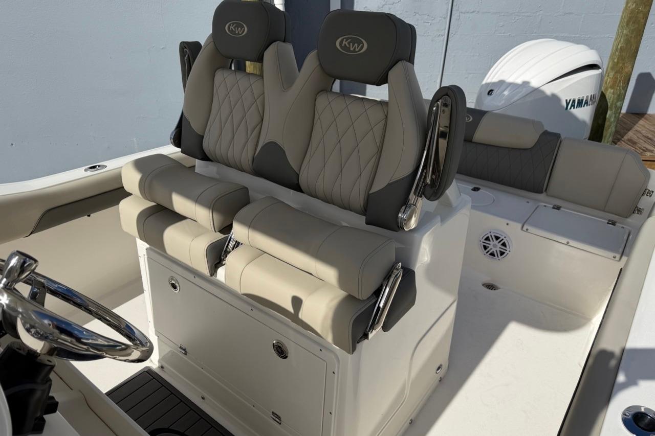 2026 Key West 239 FSR boat interior with dual seats and Yamaha engine.