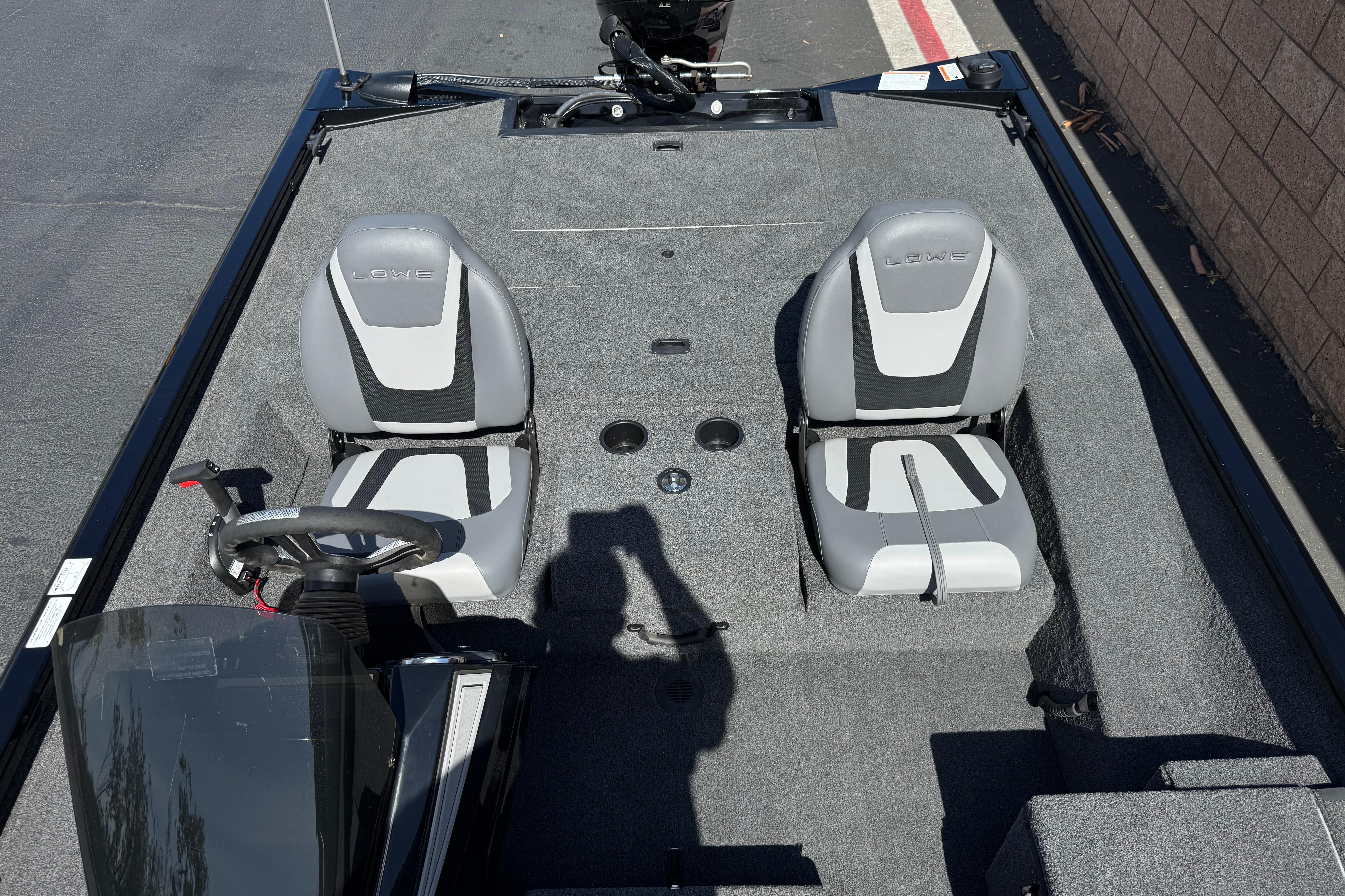 2024 Lowe Stinger 175 boat interior with dual seats and steering console.