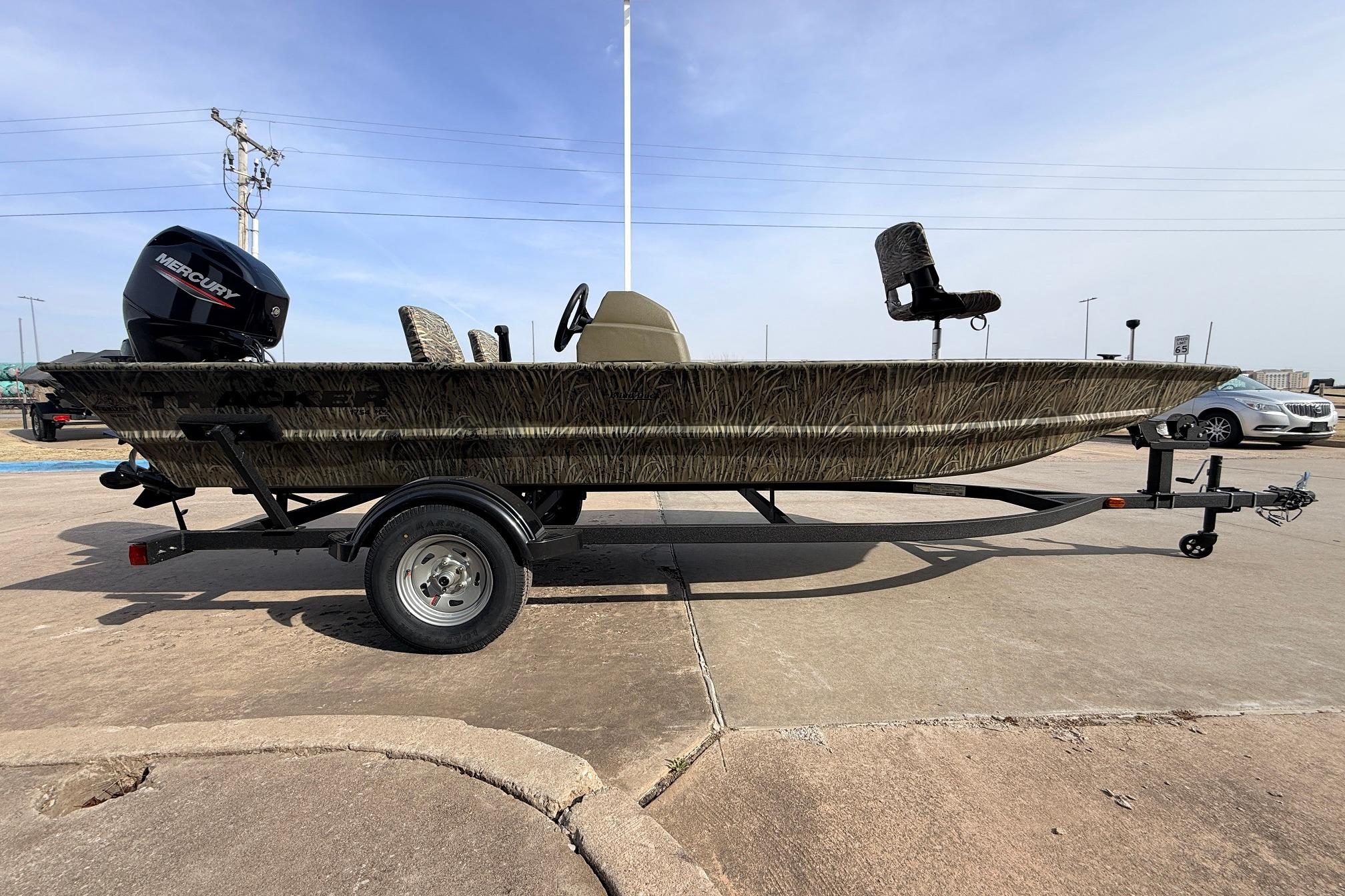 2026 Tracker Grizzly 1754 SC boat on trailer, featuring Mercury outboard motor.