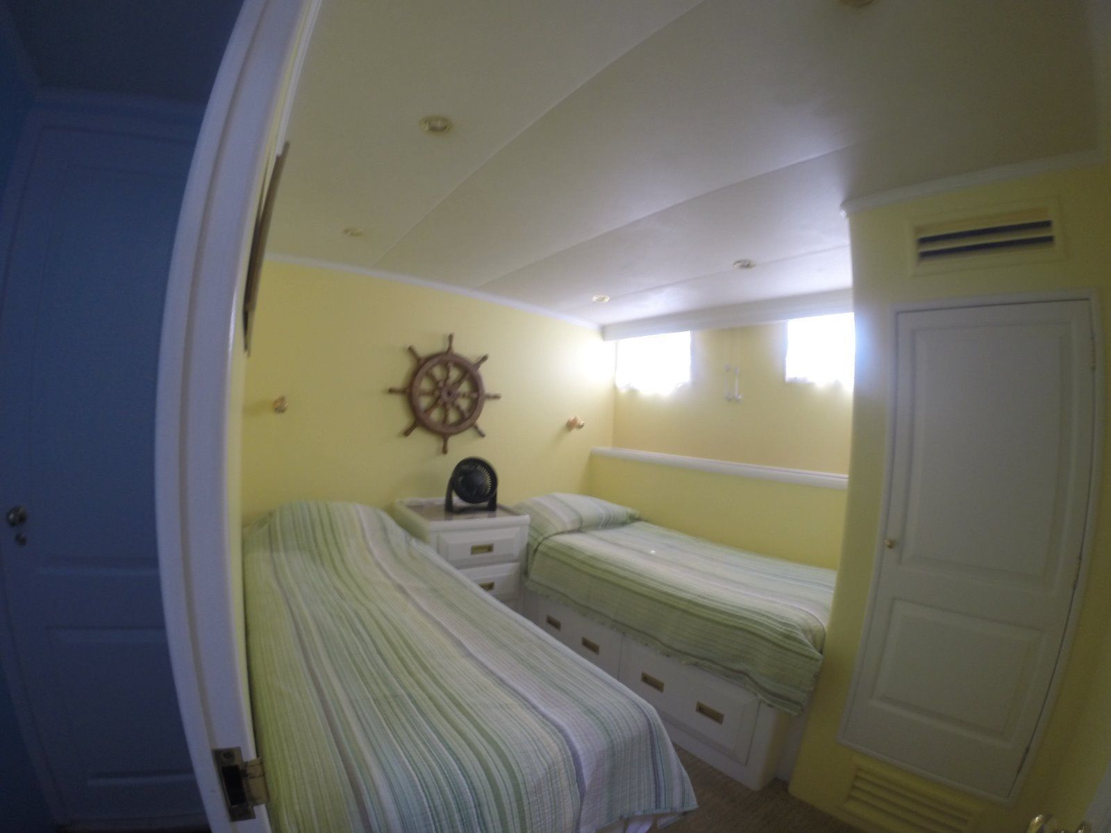 Interior of a 1963 Burger Flush Deck yacht with two beds.