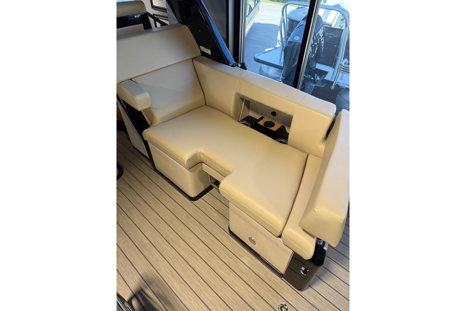 Luxurious seating on the 2026 Balise Halo 26C Twin boat, featuring beige upholstery.