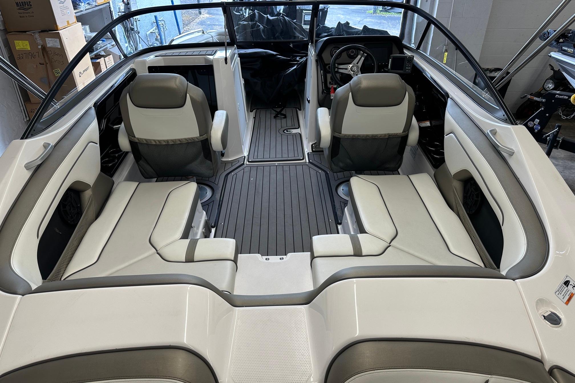 Interior of a 2018 Yamaha Boats 212 Limited, featuring sleek seating and modern design.