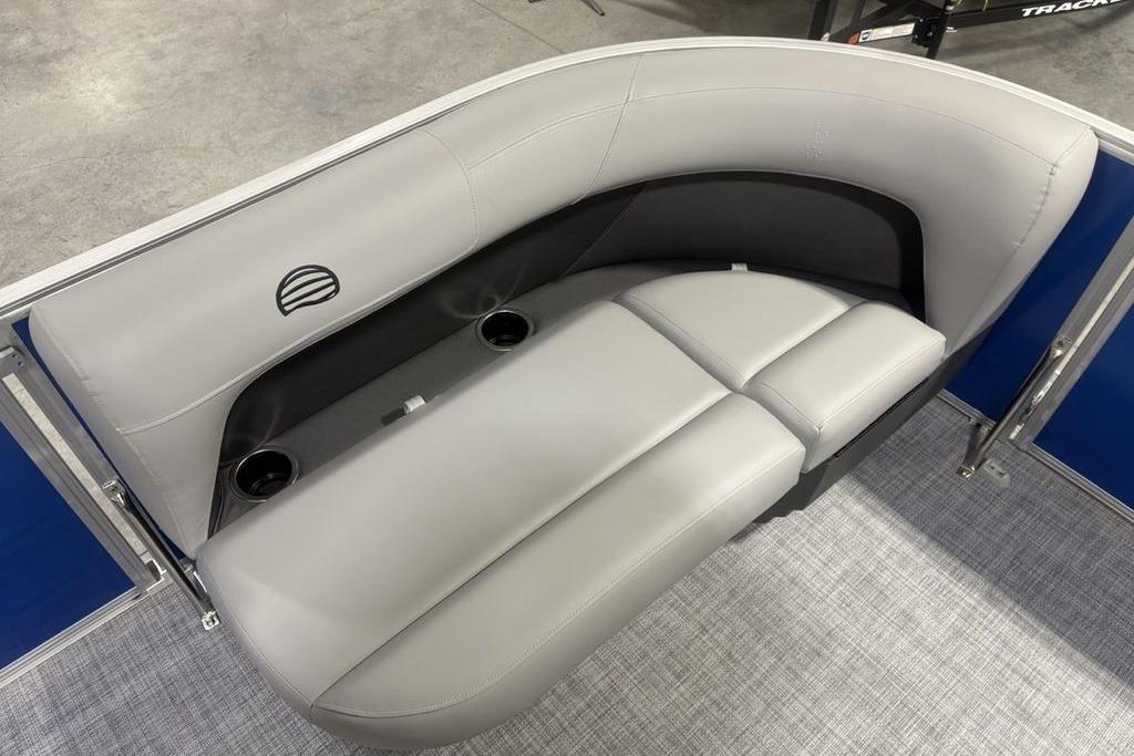 2026 Sun Tracker Party Barge 16 DLX pontoon seating with cup holders and sleek design.