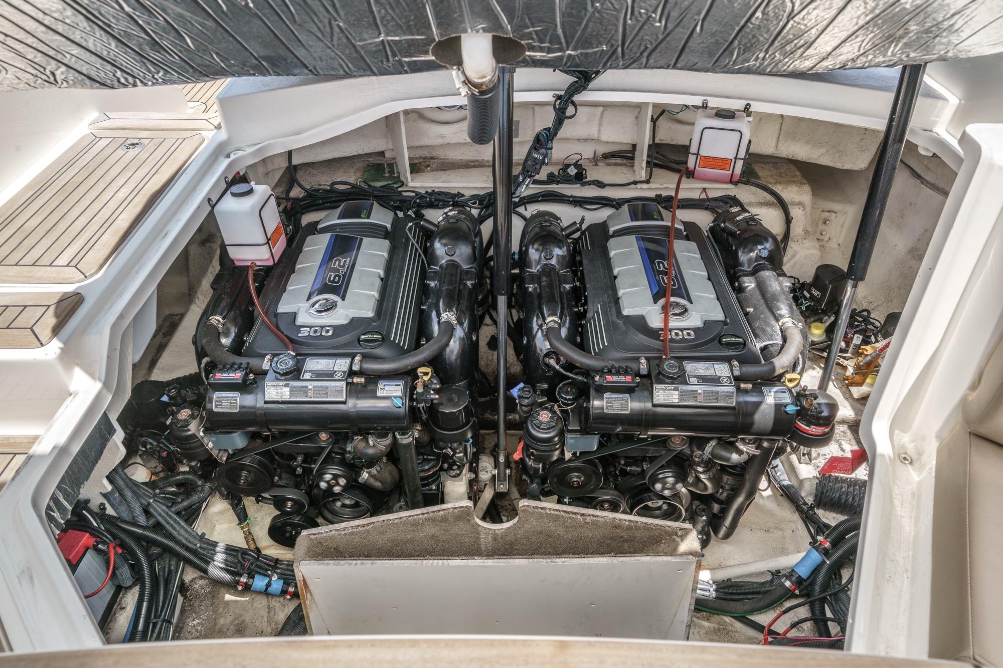Twin engines in a 2018 Sea Ray SLX 310 boat, showcasing powerful marine engineering.