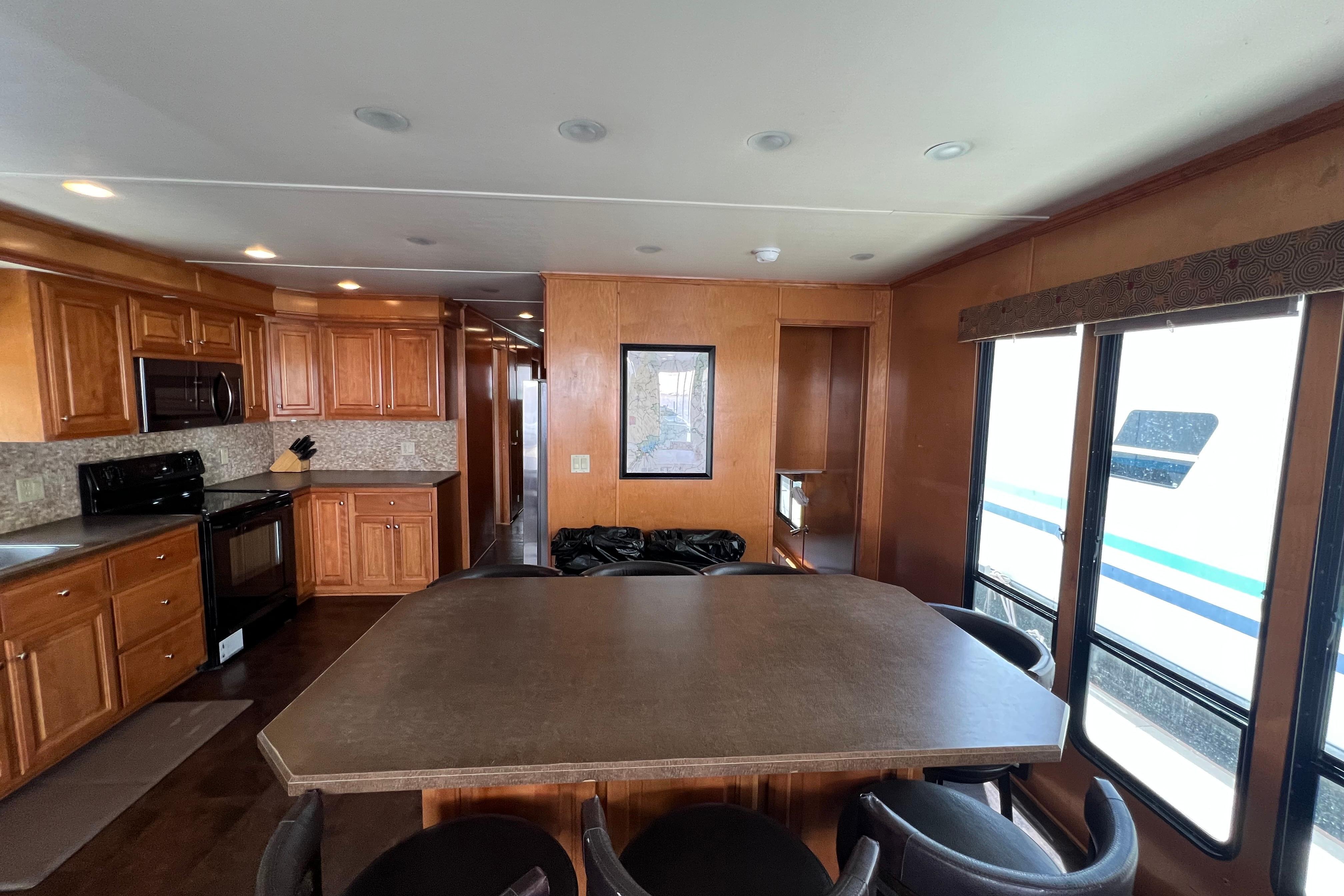 Interior of 2013 Destination Yacht Lotta Yachta with kitchen and dining area.