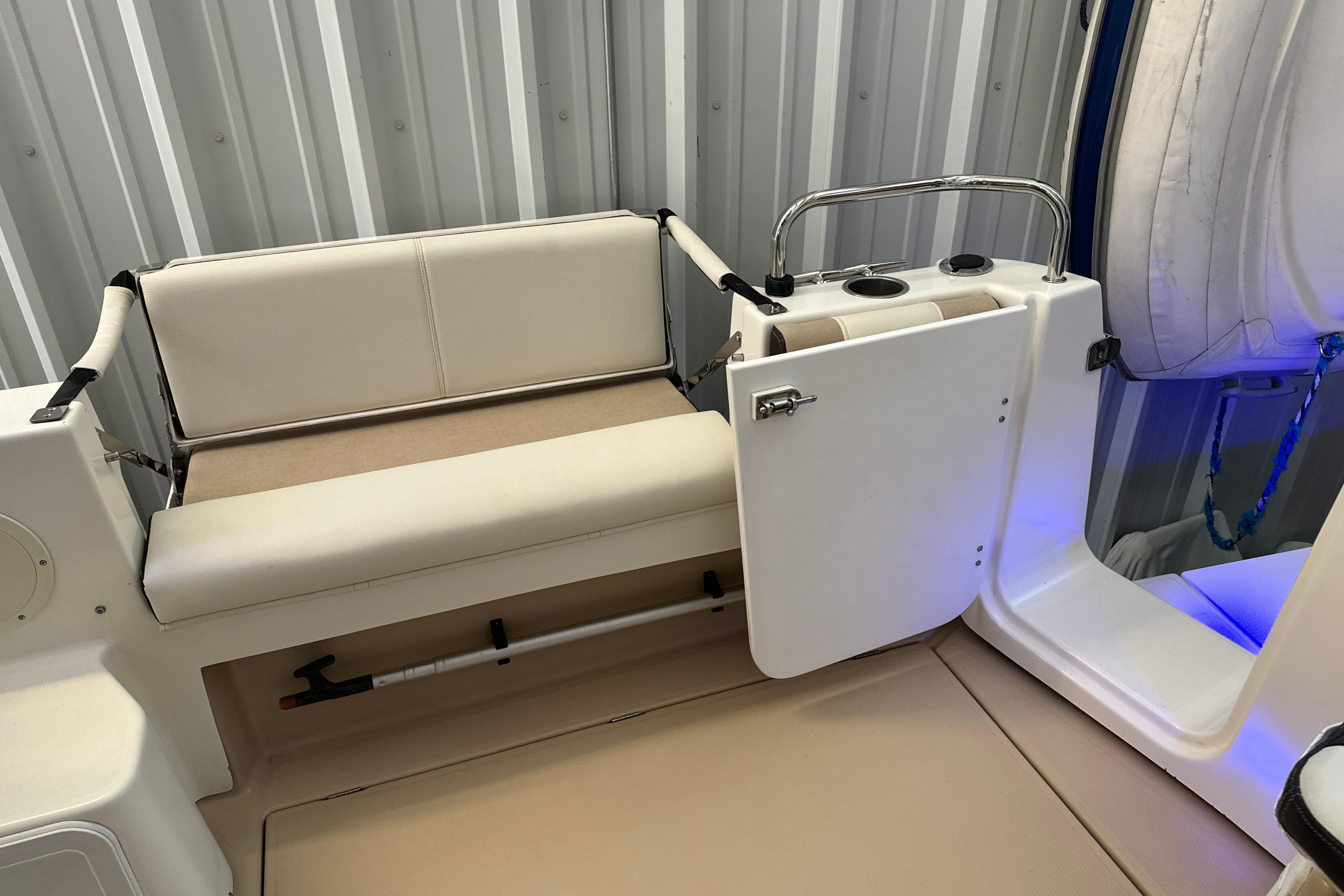 Interior of 2017 Cutwater C-30 Sedan boat with seating and storage area.
