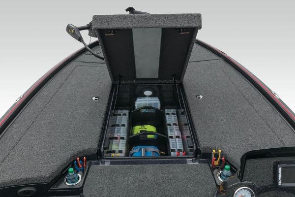 2022 Nitro Z20 boat with open storage compartment and organized tackle boxes.