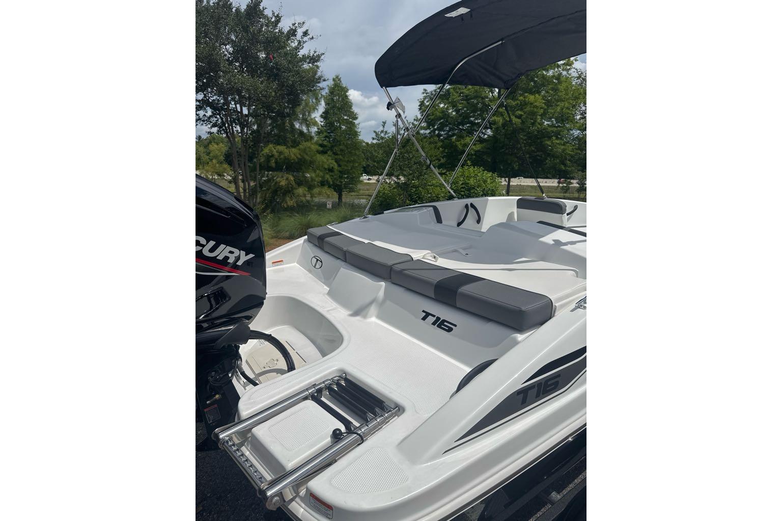 2026 Tahoe T16 boat with Mercury engine, featuring sleek design and comfortable seating.