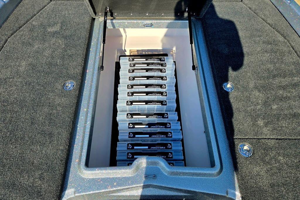 Storage compartment of 2026 Skeeter ZXE20 boat with organized battery setup.