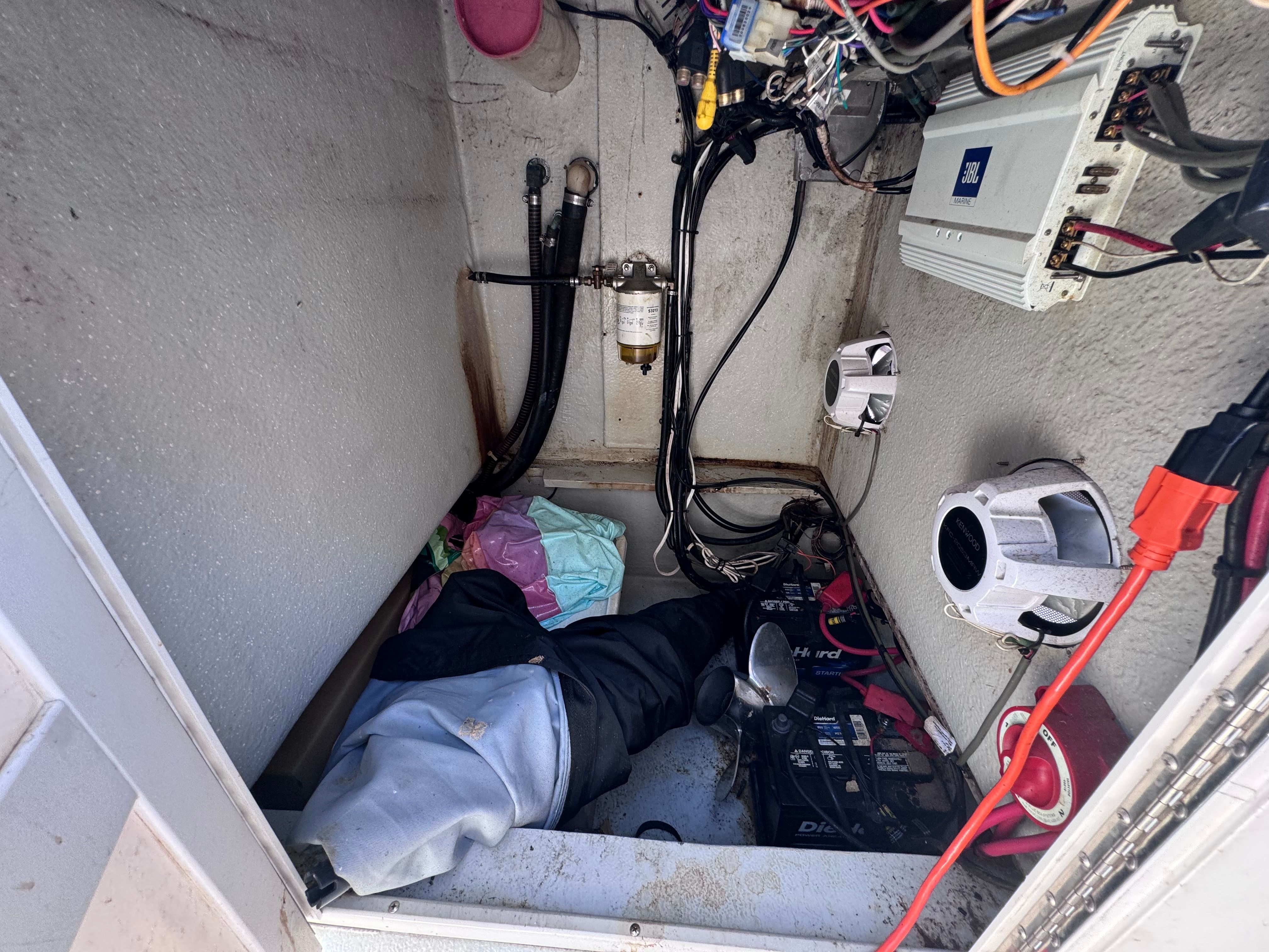 Interior of a 1998 Dusky 20.3 boat with electronics and wiring.