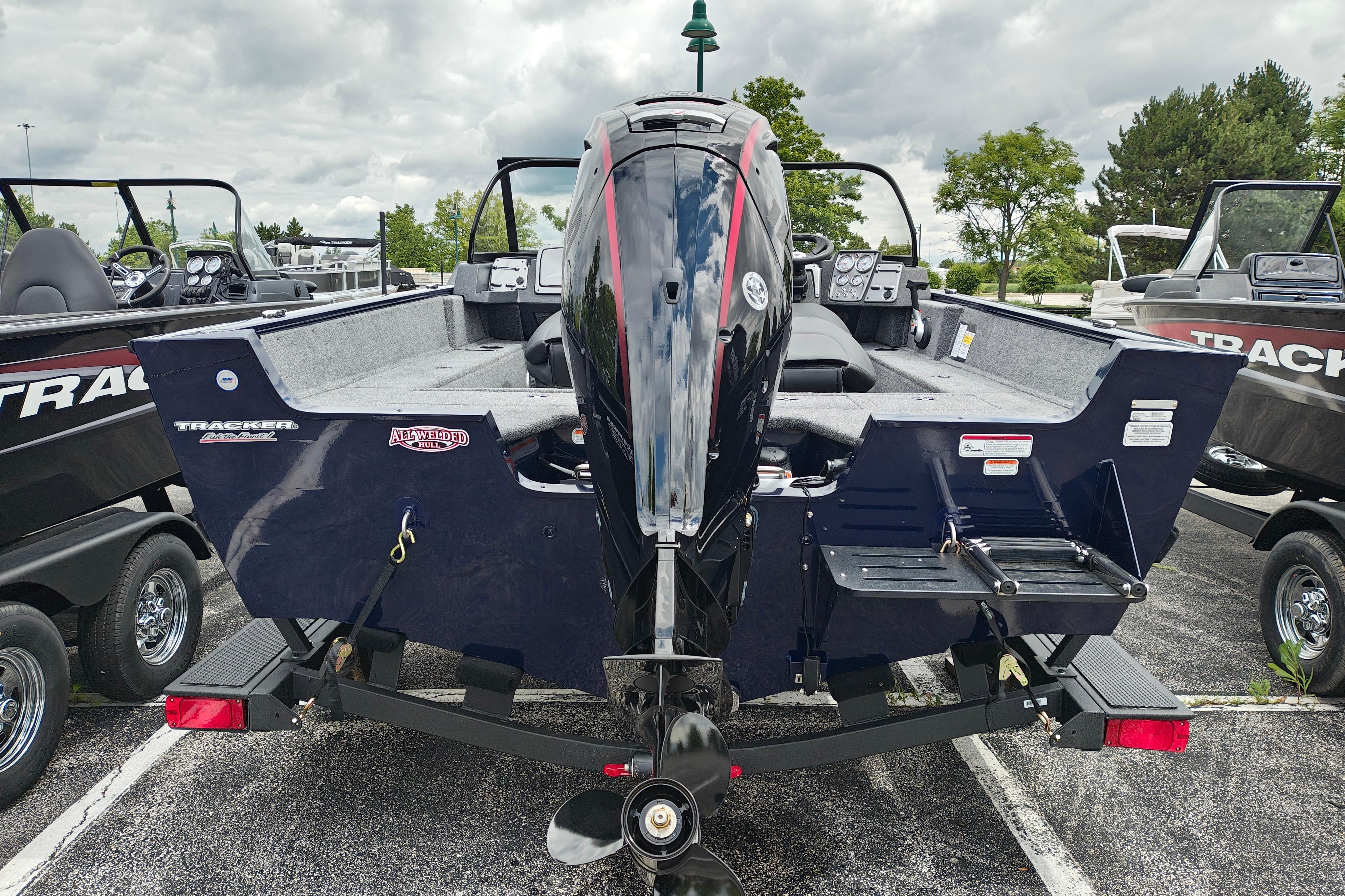2026 Tracker Pro Guide V-175 WT boat, rear view, parked outdoors on a trailer.