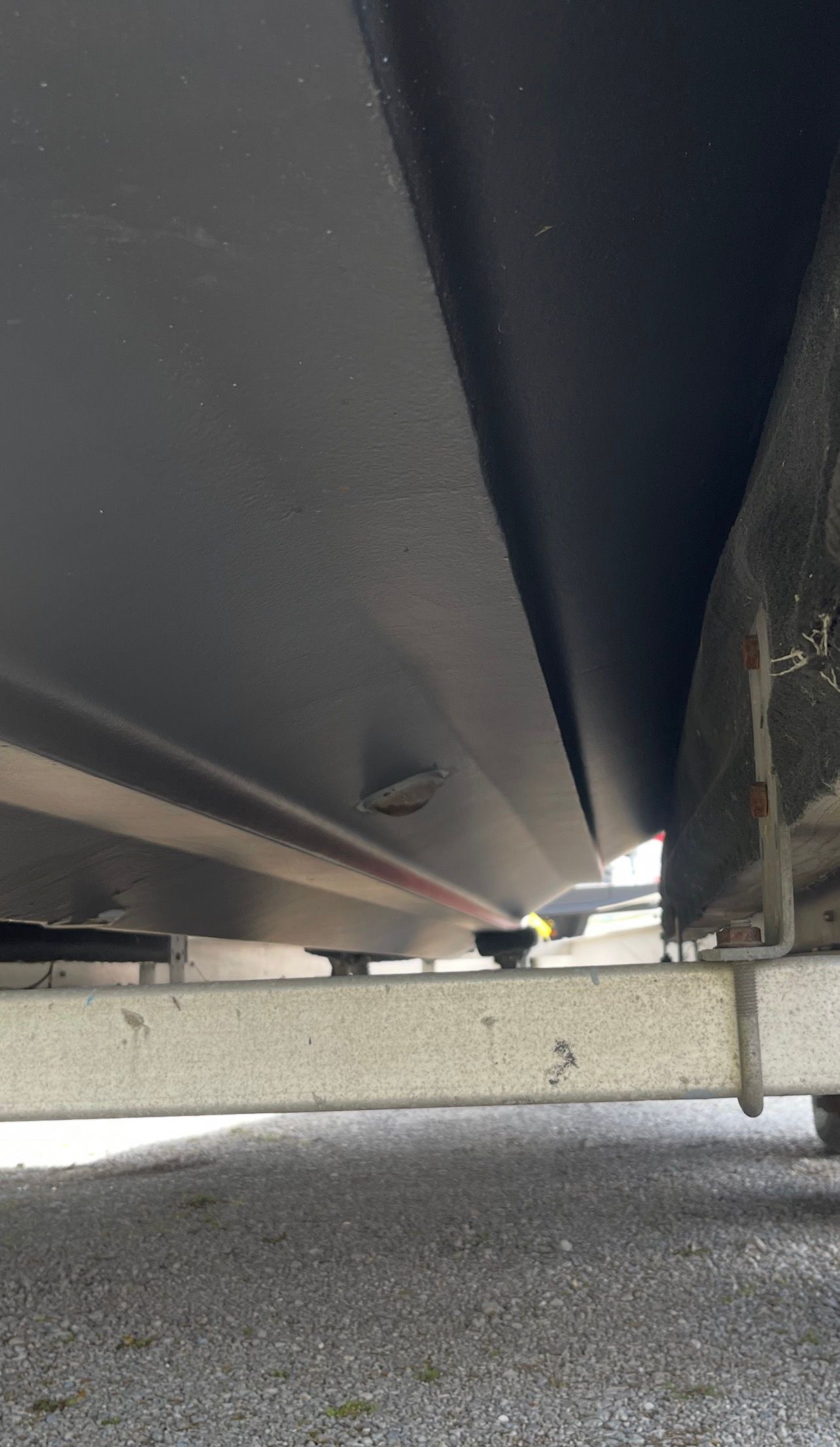 Underside of a 2006 Sea Ray 270 Amberjack boat on a trailer.