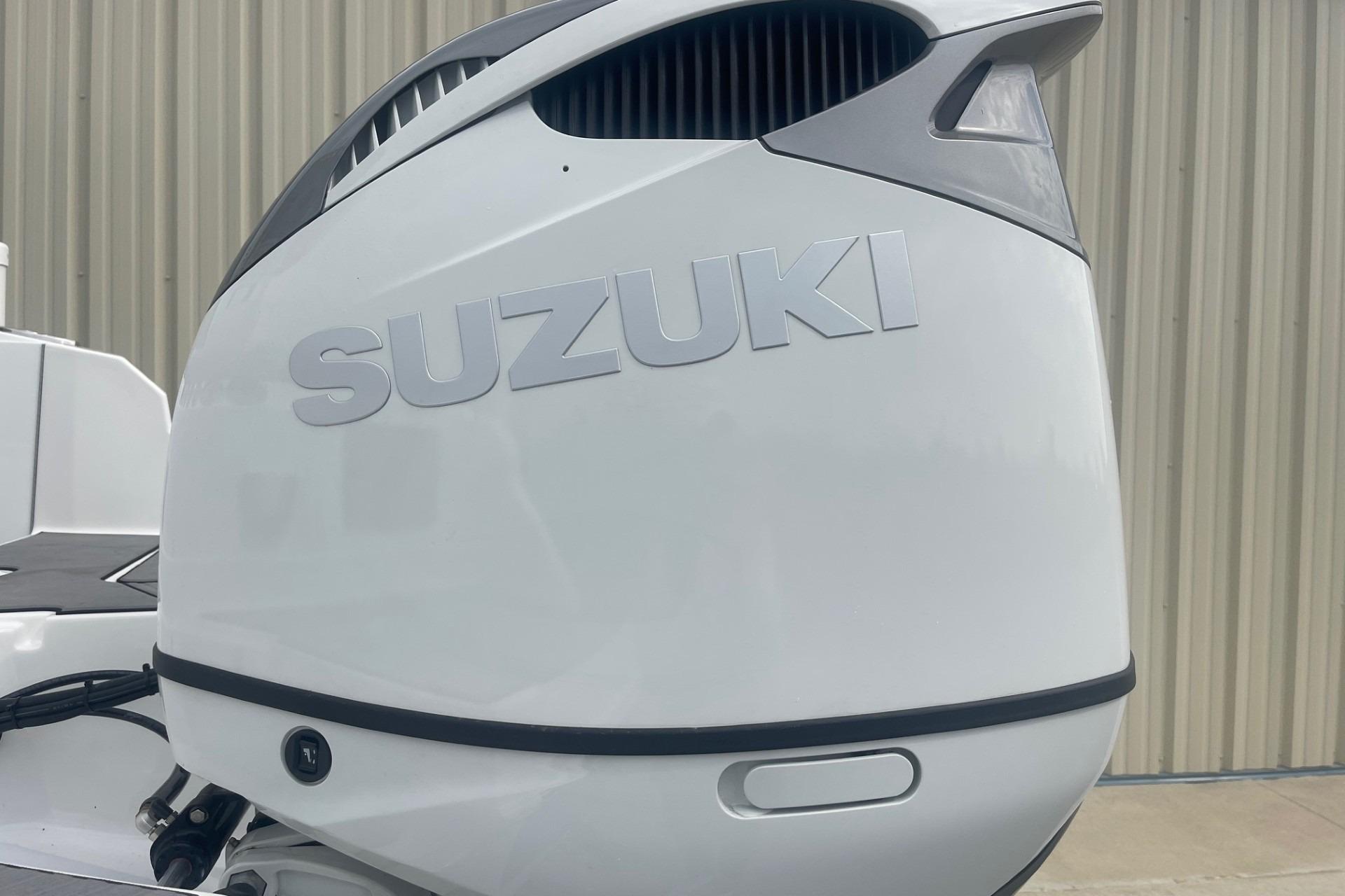 2025 Hurricane Center Console 24 OB with Suzuki outboard motor.