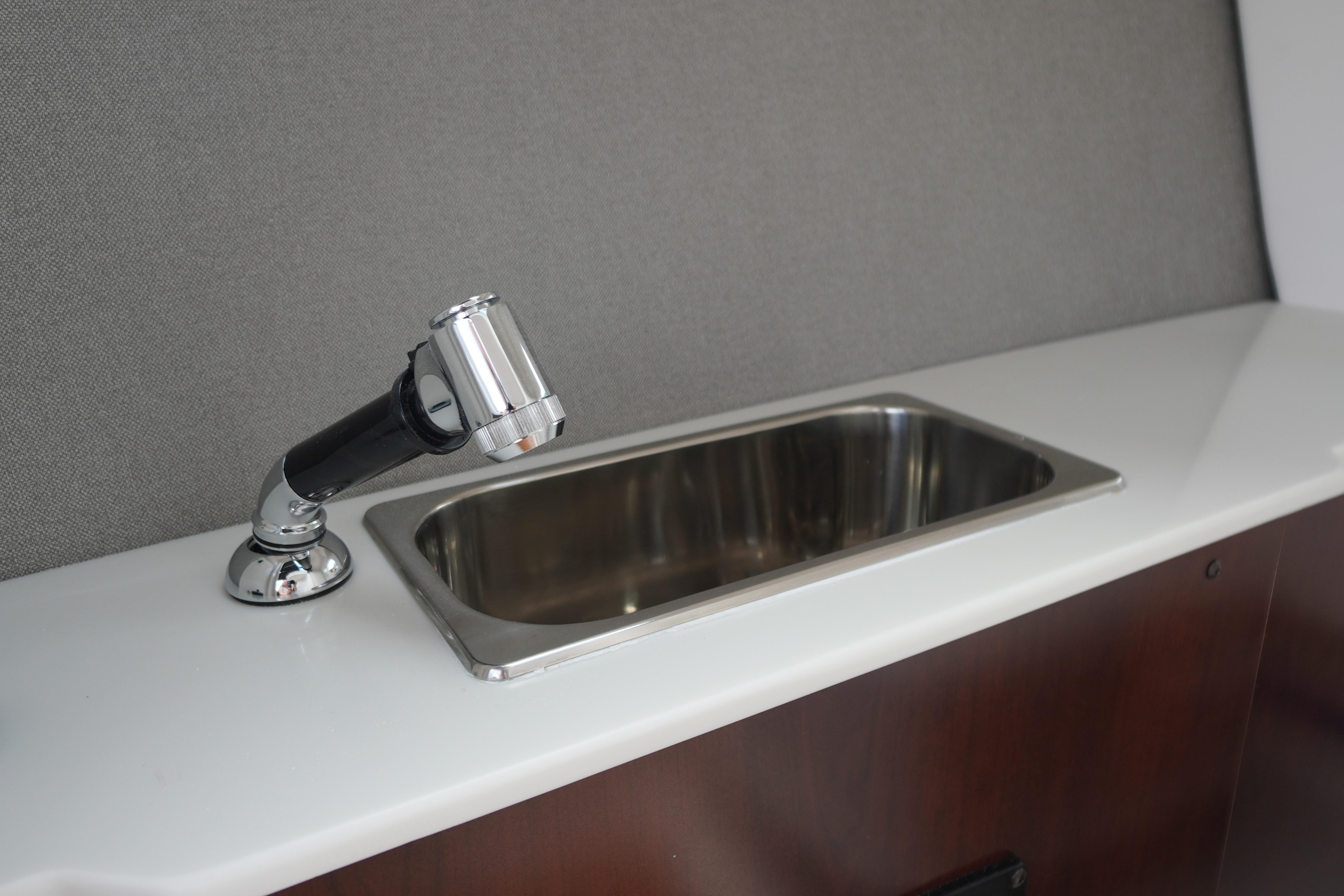 2026 Chaparral SSX 4 boat interior with sleek sink and modern faucet design.
