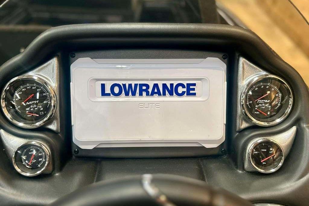 Dashboard of 2026 Triton 18 TrX with Lowrance Elite display and gauges.