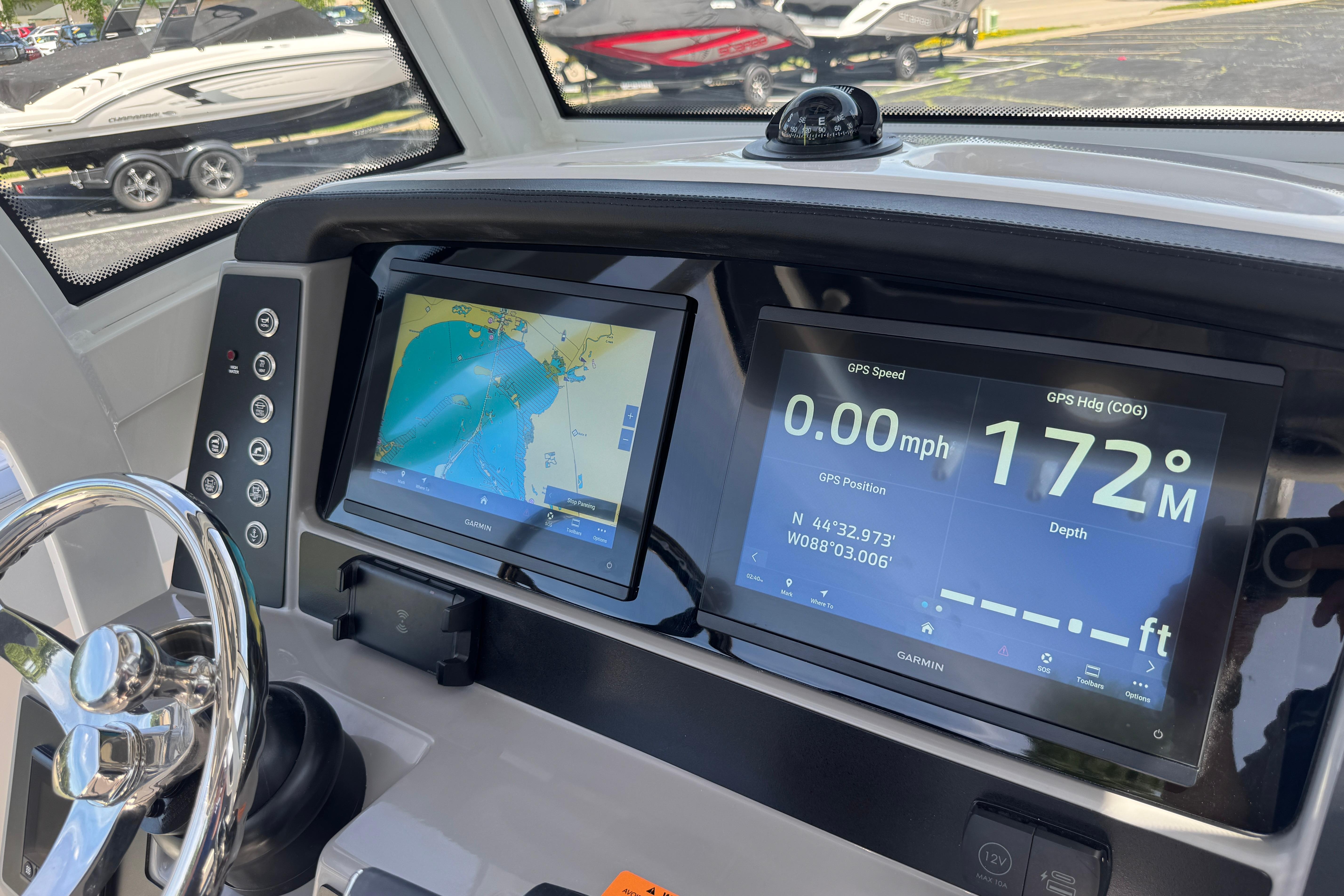 Dashboard of 2026 Robalo R250 Center Console with GPS navigation display.