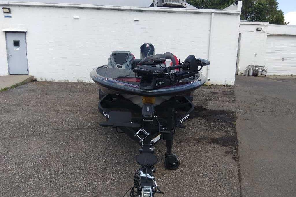 2026 Nitro Z20 XL Pro boat parked in an industrial area.