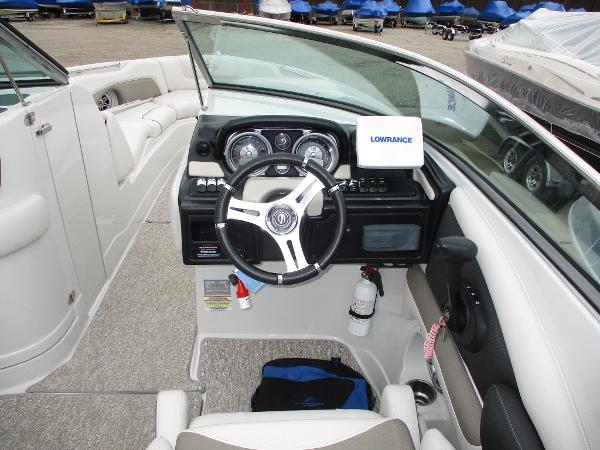 Interior view of a 2015 Crownline 285 SS boat with steering console.