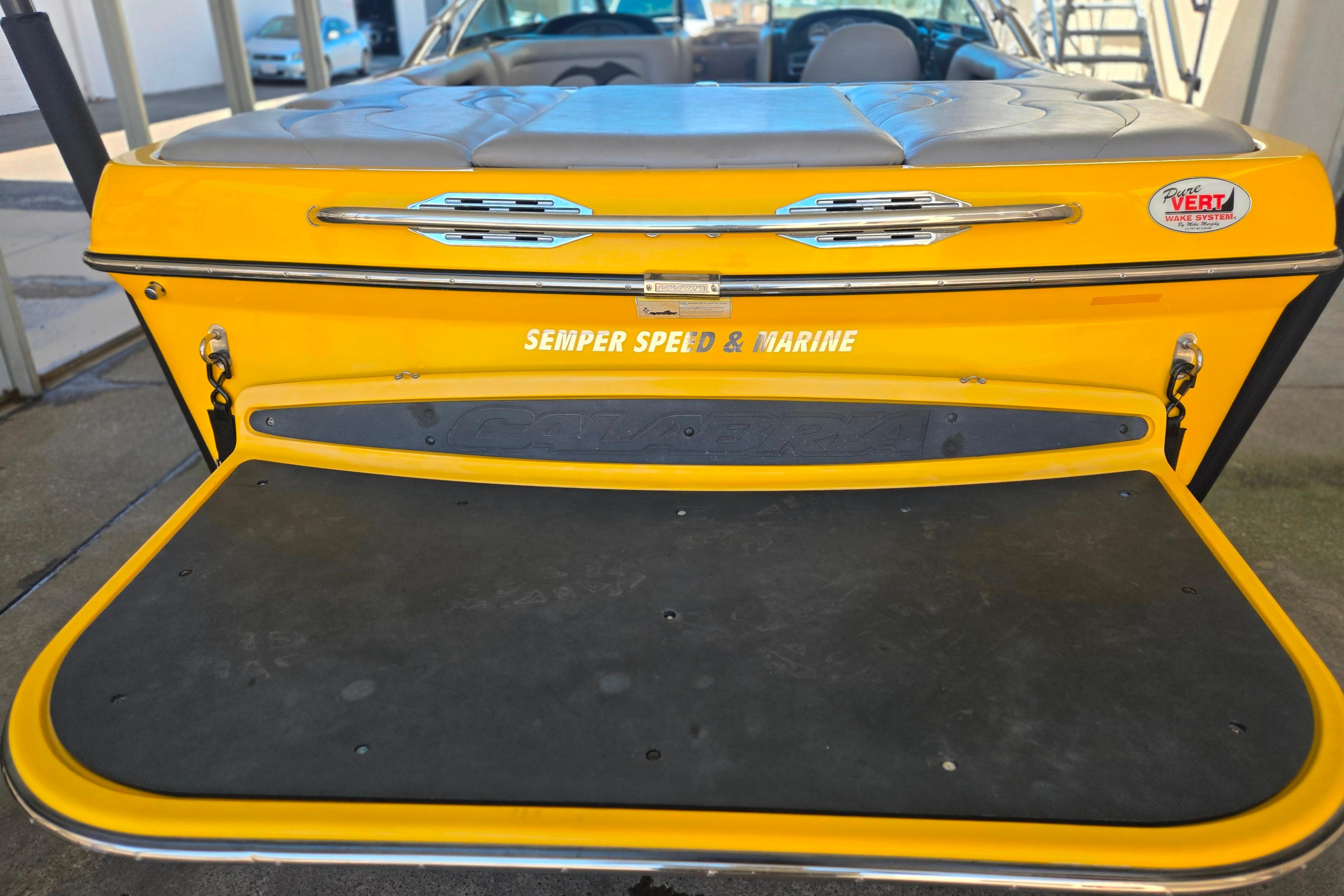 2007 Calabria CAL AIR PRO V boat with yellow deck and "Semper Speed & Marine" branding.