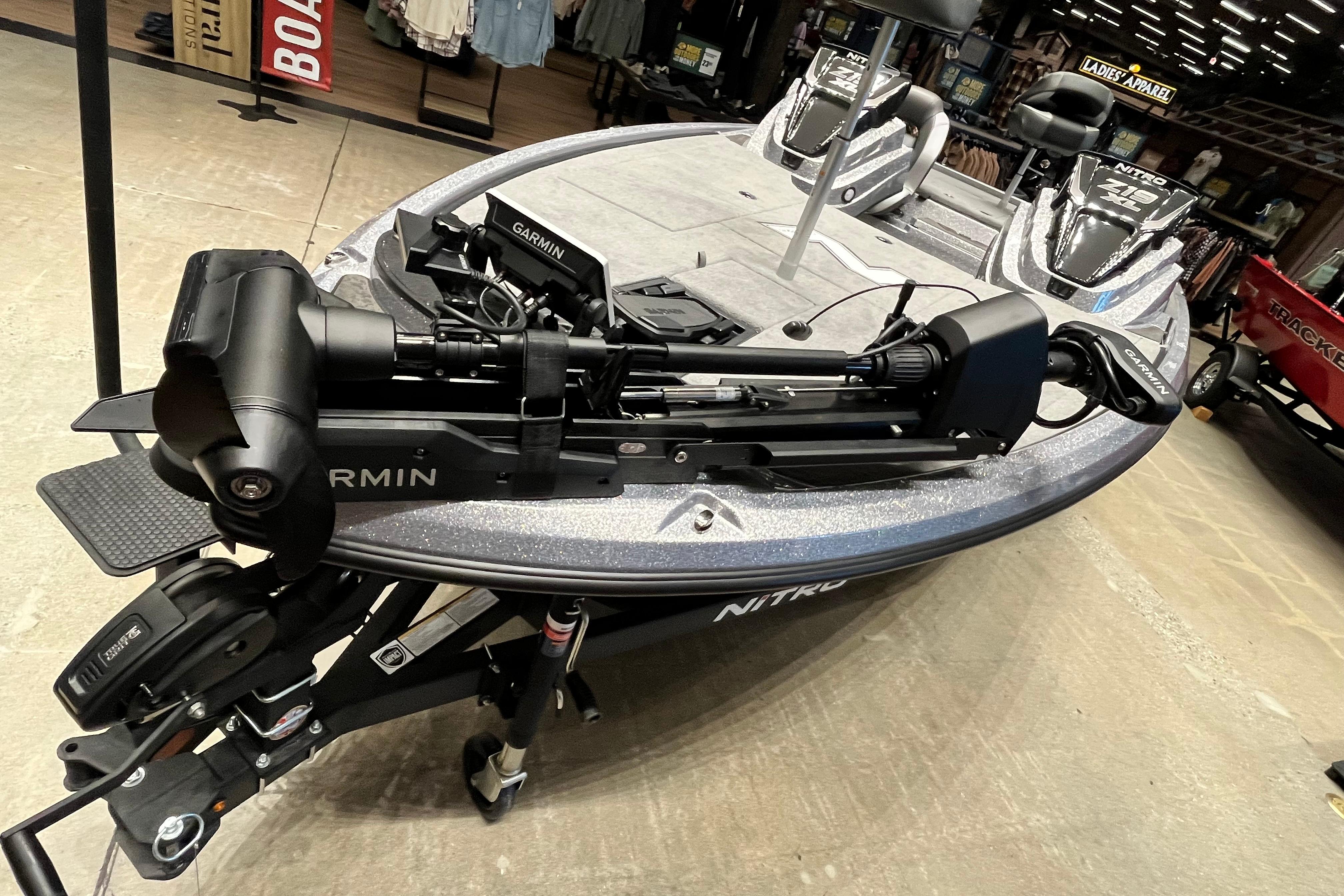2026 Nitro Z19 XL Pro boat with Garmin equipment displayed indoors.