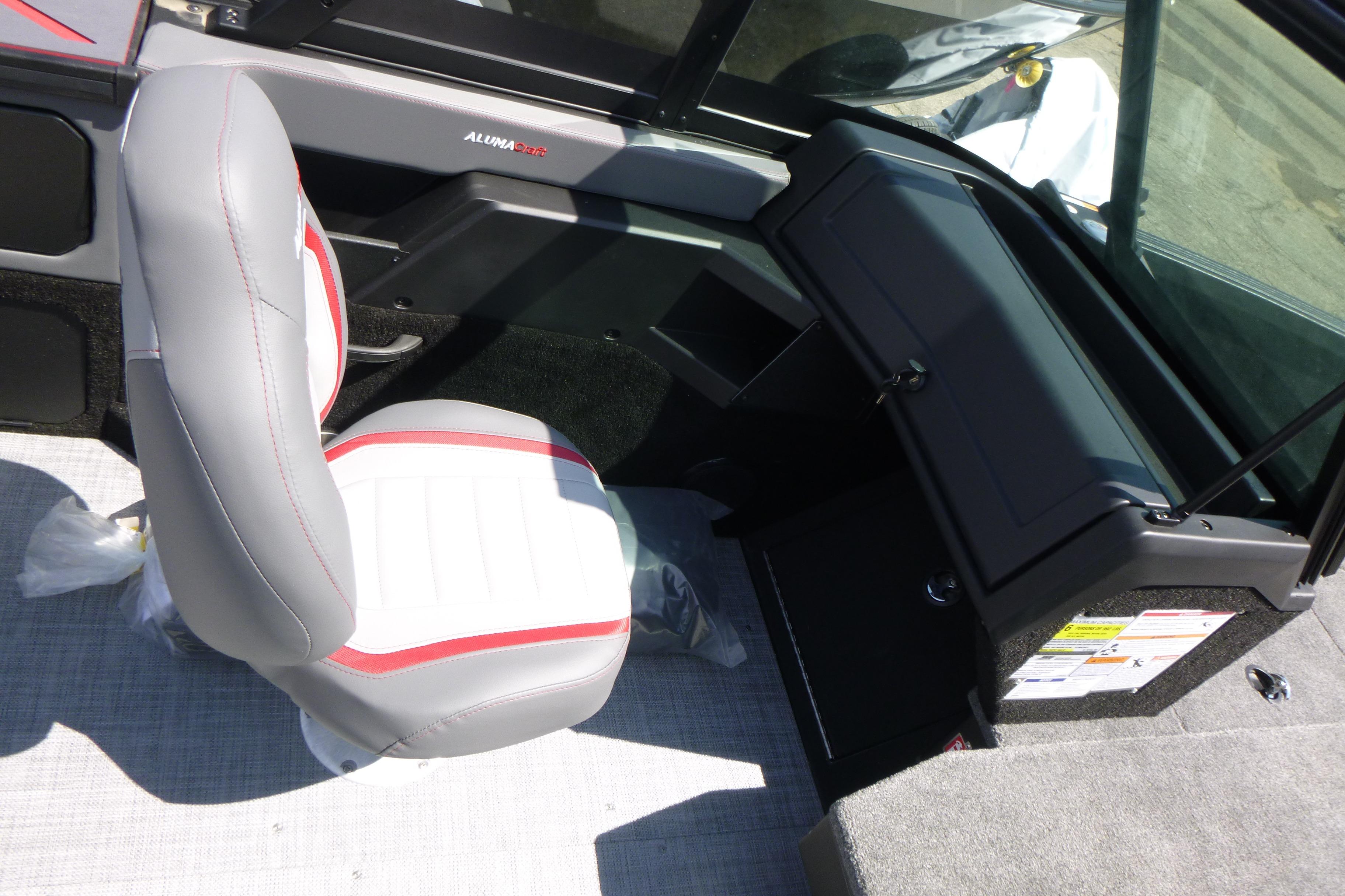 2025 Alumacraft Trophy 185X Sport boat interior with gray and red seating.
