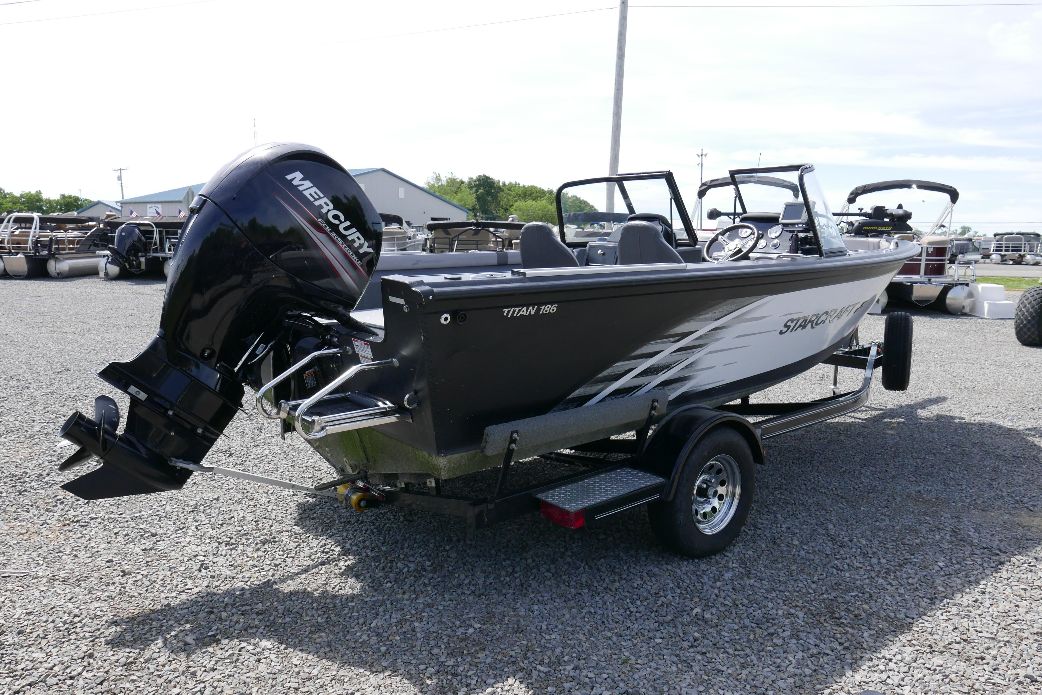 2016 Starcraft Titan 186 boat with Mercury outboard motor on trailer.