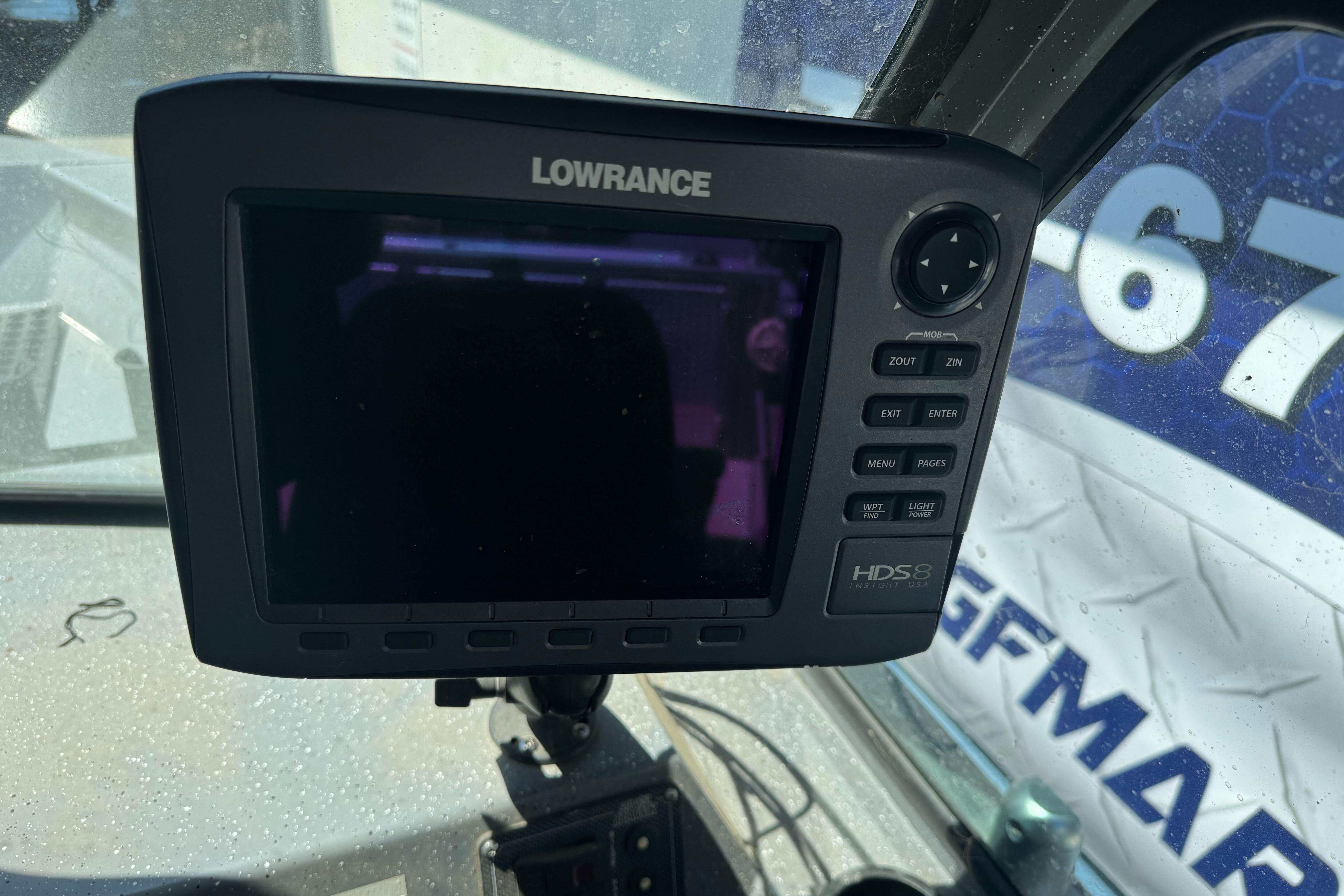 Lowrance HDS-8 fishfinder on 2014 River Hawk 19 GB boat dashboard.