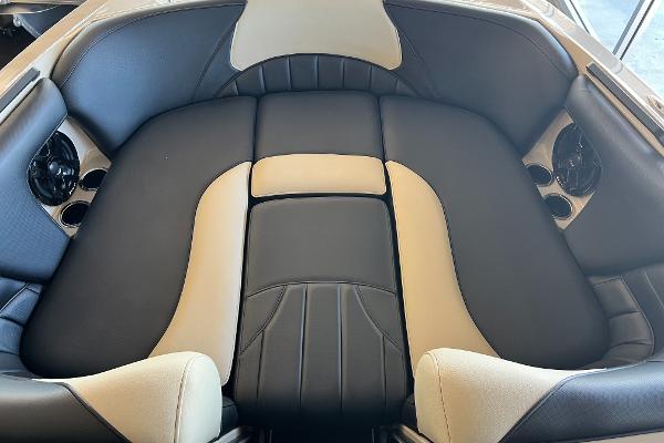 Luxurious interior of 2024 MB F22 Tomcat boat with plush seating.