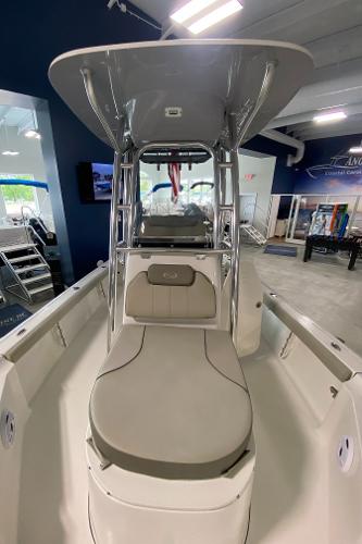 2024 Key West 250 Bay Reef boat interior with seating and console.