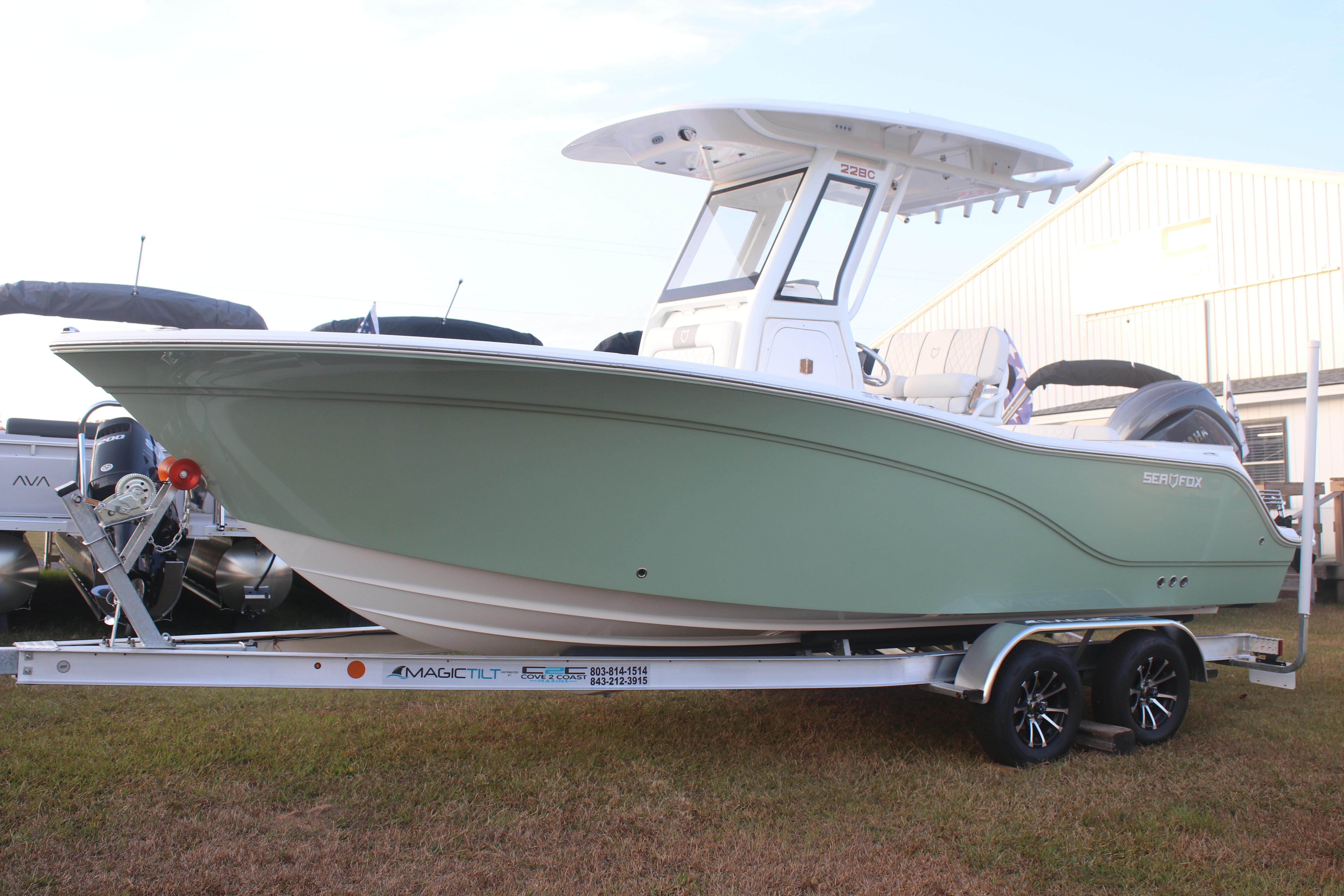 2026 Sea Fox 228 Commander boat on trailer, displayed outdoors.