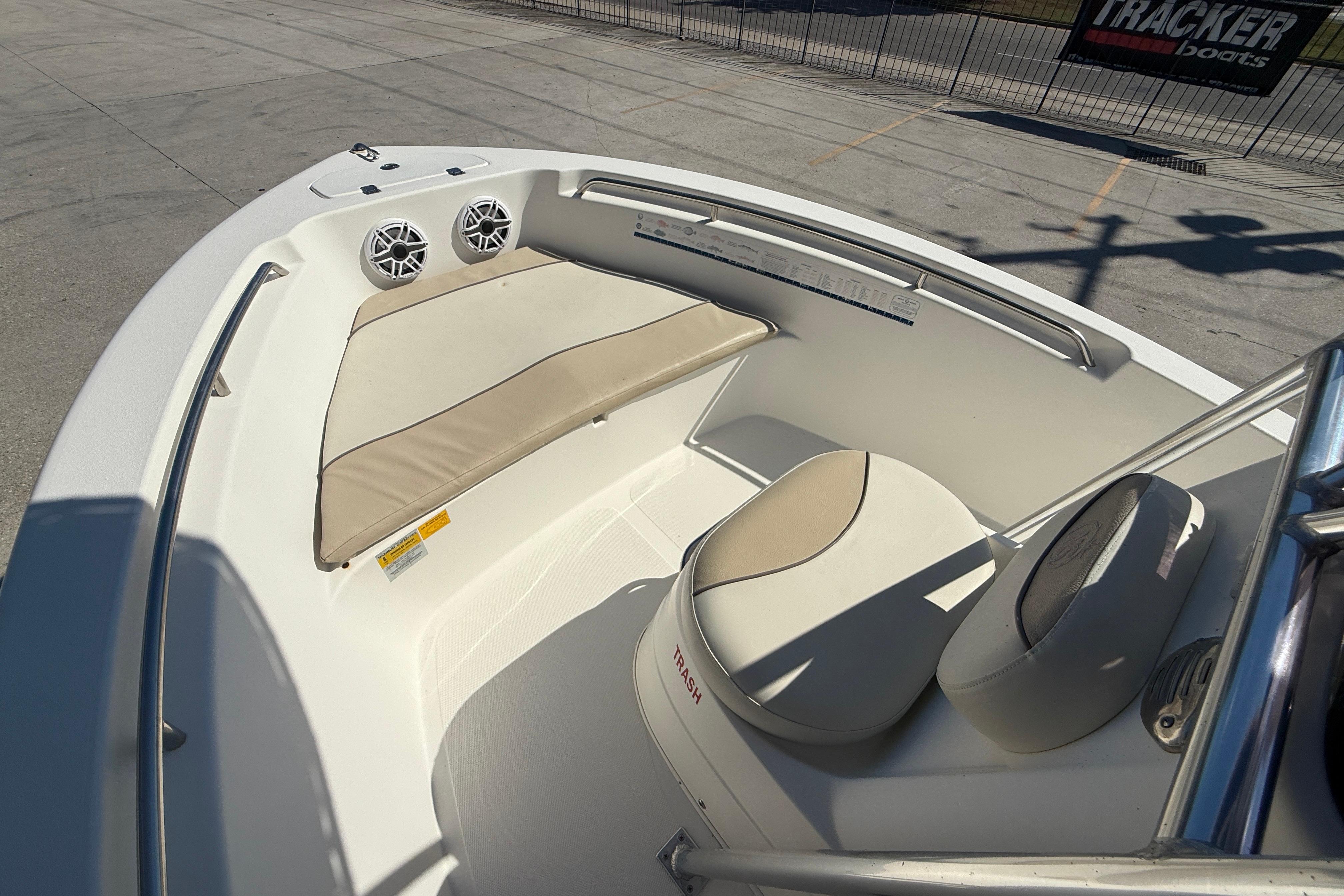 2019 NauticStar 19 XS boat interior with cushioned seating and speakers.