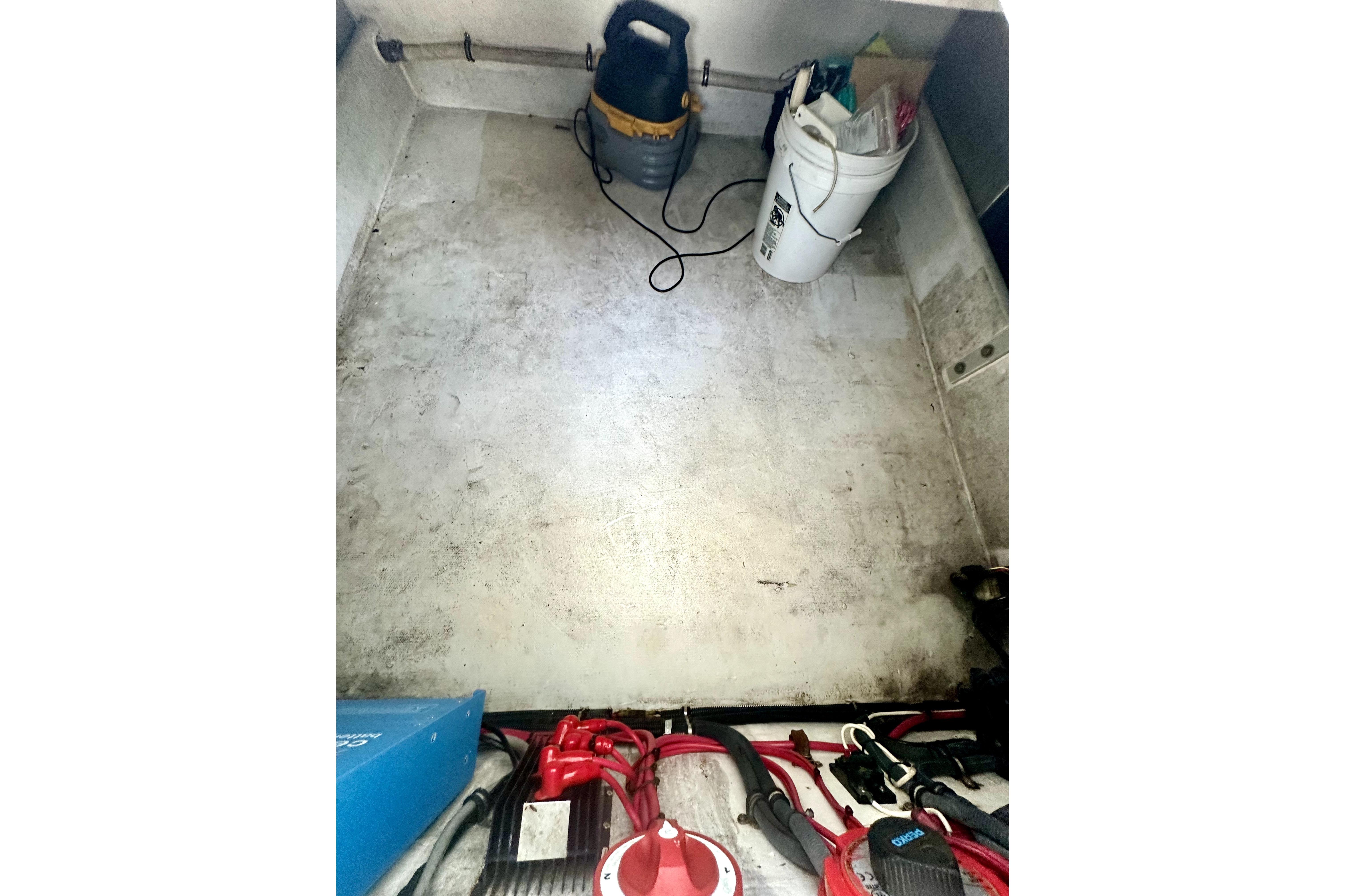 2006 Contender 35 Express Side Console interior with equipment and storage items.