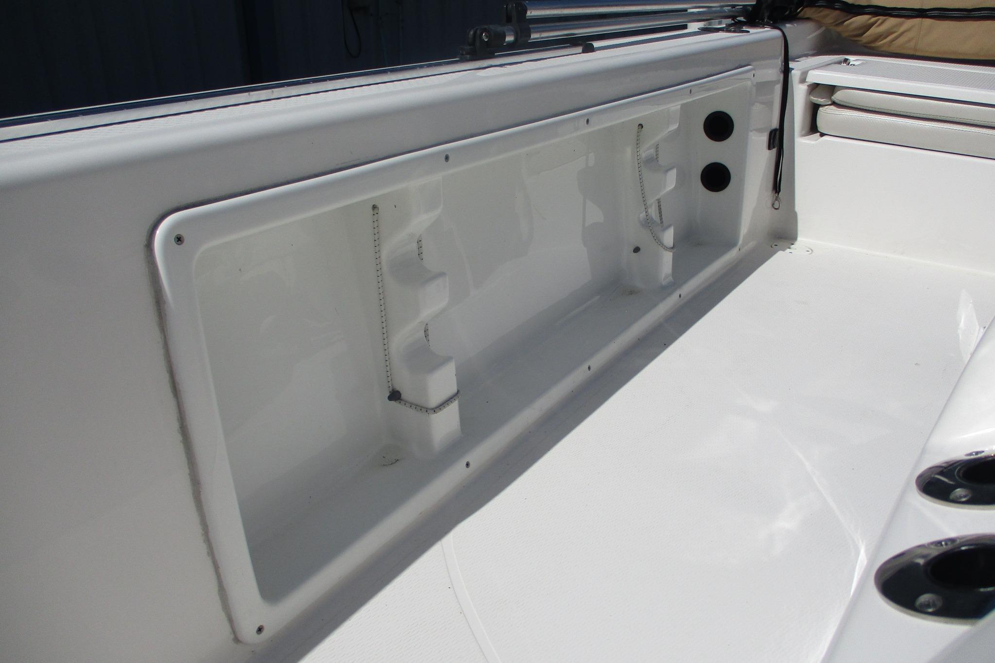 2021 Blue Wave 2000 PureBay boat interior storage compartment detail.