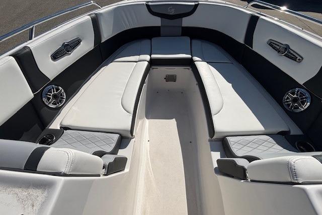 2024 Chaparral 30 Surf boat interior with luxurious seating and modern design.