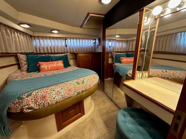 Interior of Carver 3807 yacht featuring cozy bedroom.